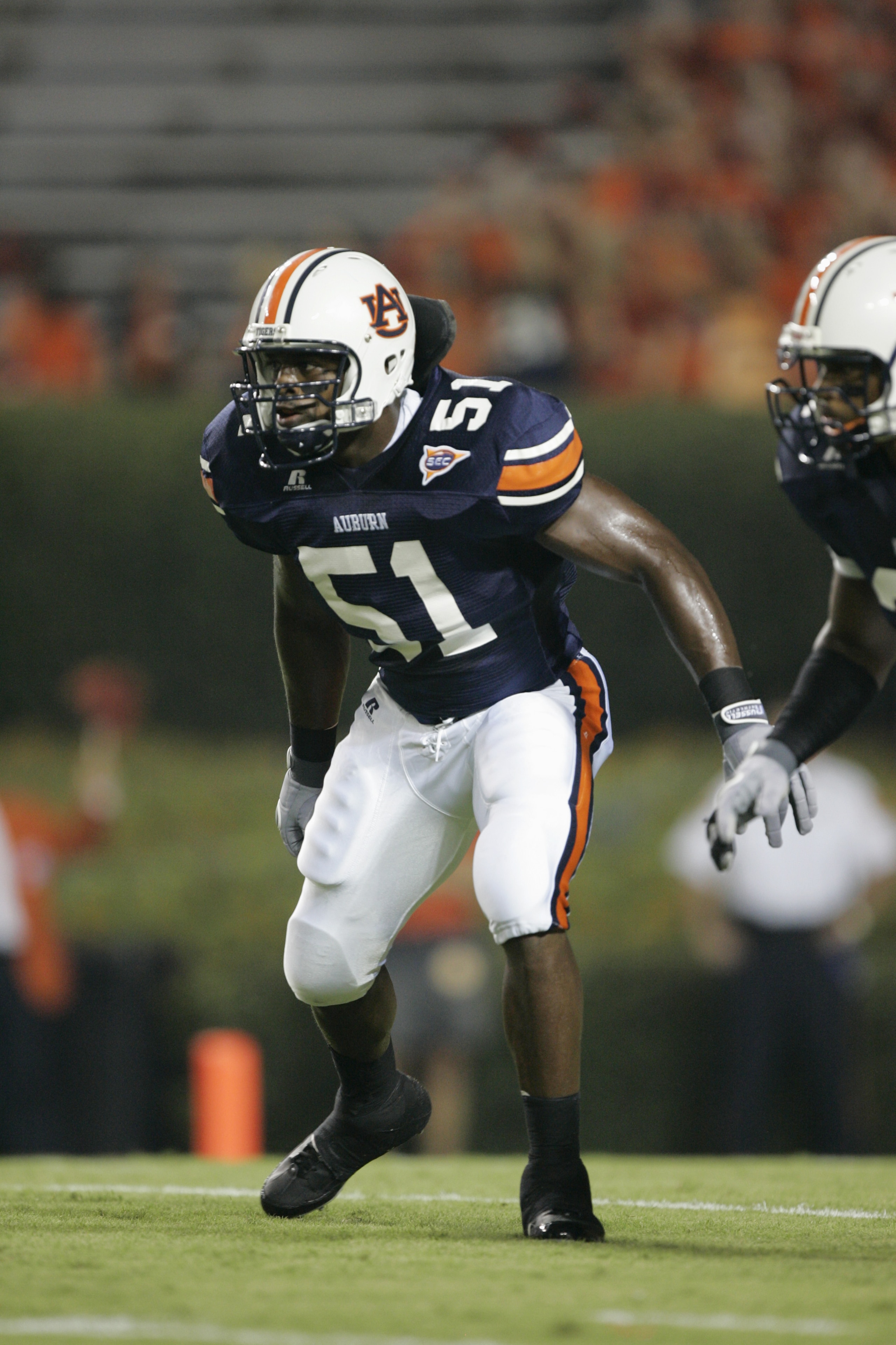 AUBURN, AL - SEPTEMBER 3:  Linebacker Travis Williams #51 of the Auburn Tigers gets set for play against the Georgia Tech Yellow Jackets during the game on September 3, 2005 at Jordan-Hare Stadium in Auburn, Alabama.  Georgia Tech won 23-14.  (Photo by Br