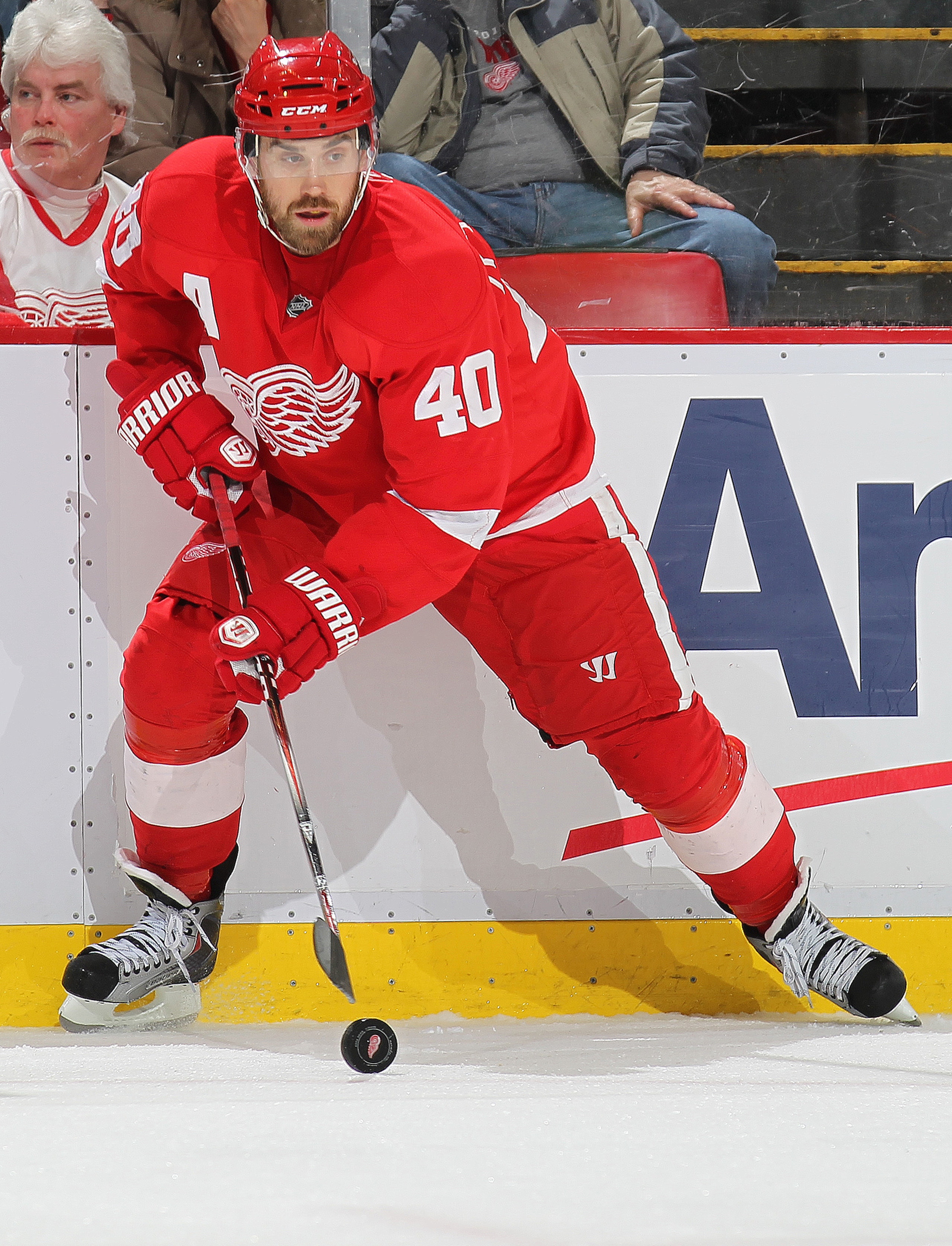 DETROIT, MI - MARCH 9:  Henrik Zetterberg #40 of the Detroit Red Wings controls the puck in a game against the Los Angeles Kings on March 9, 2011 at the Joe Louis Arena in Detroit, Michigan. The Kings defeated the Wings 2-1. (Photo by Claus Andersen/Getty