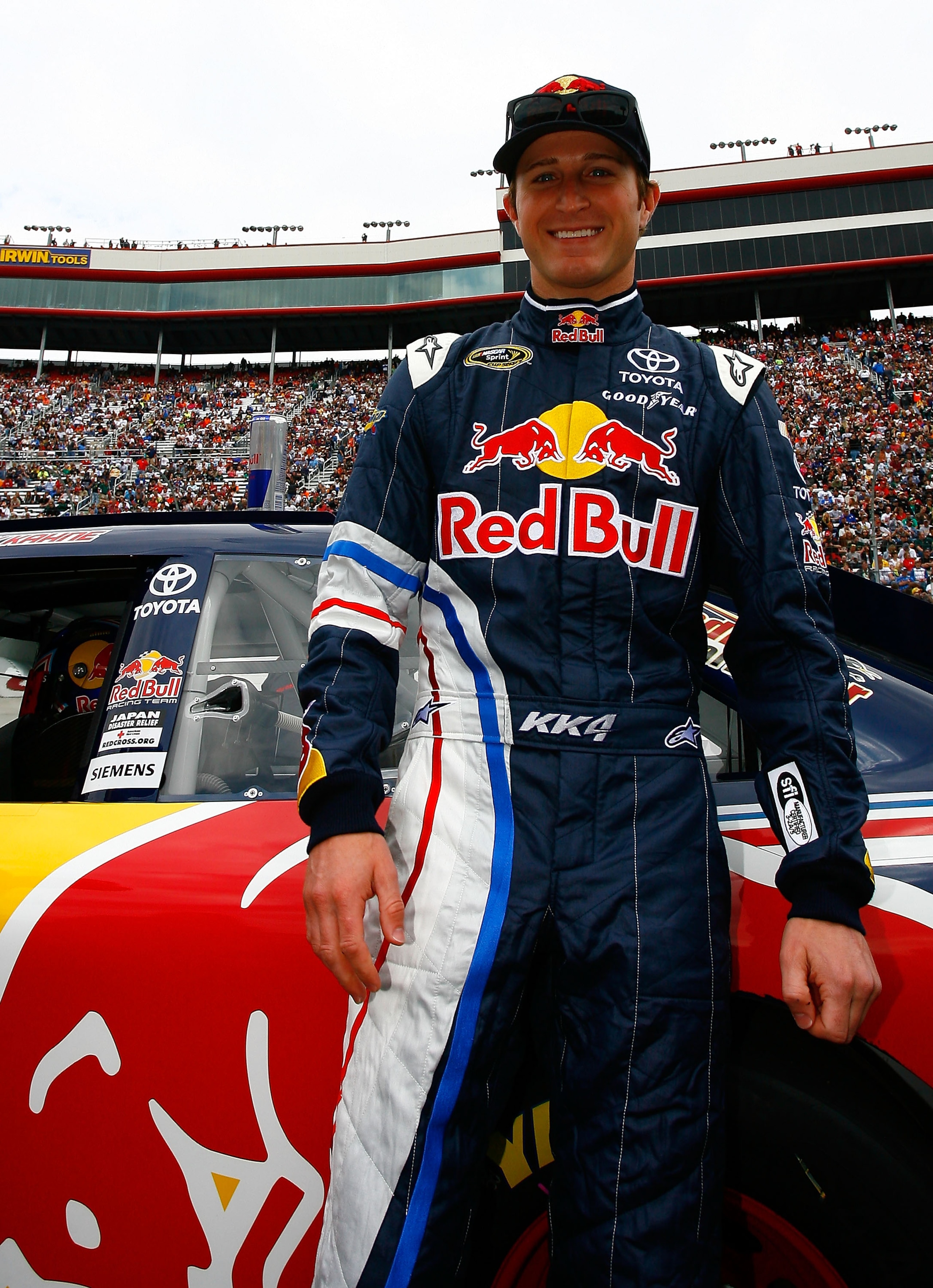 BRISTOL, TN - MARCH 20:  Kasey Kahne, driver of the #4 Red Bull Toyota, stands on the grid prior to the NASCAR Sprint Cup Series Jeff Byrd 500 Presented By Food City at Bristol Motor Speedway on March 20, 2011 in Bristol, Tennessee.  (Photo by Jason Smith