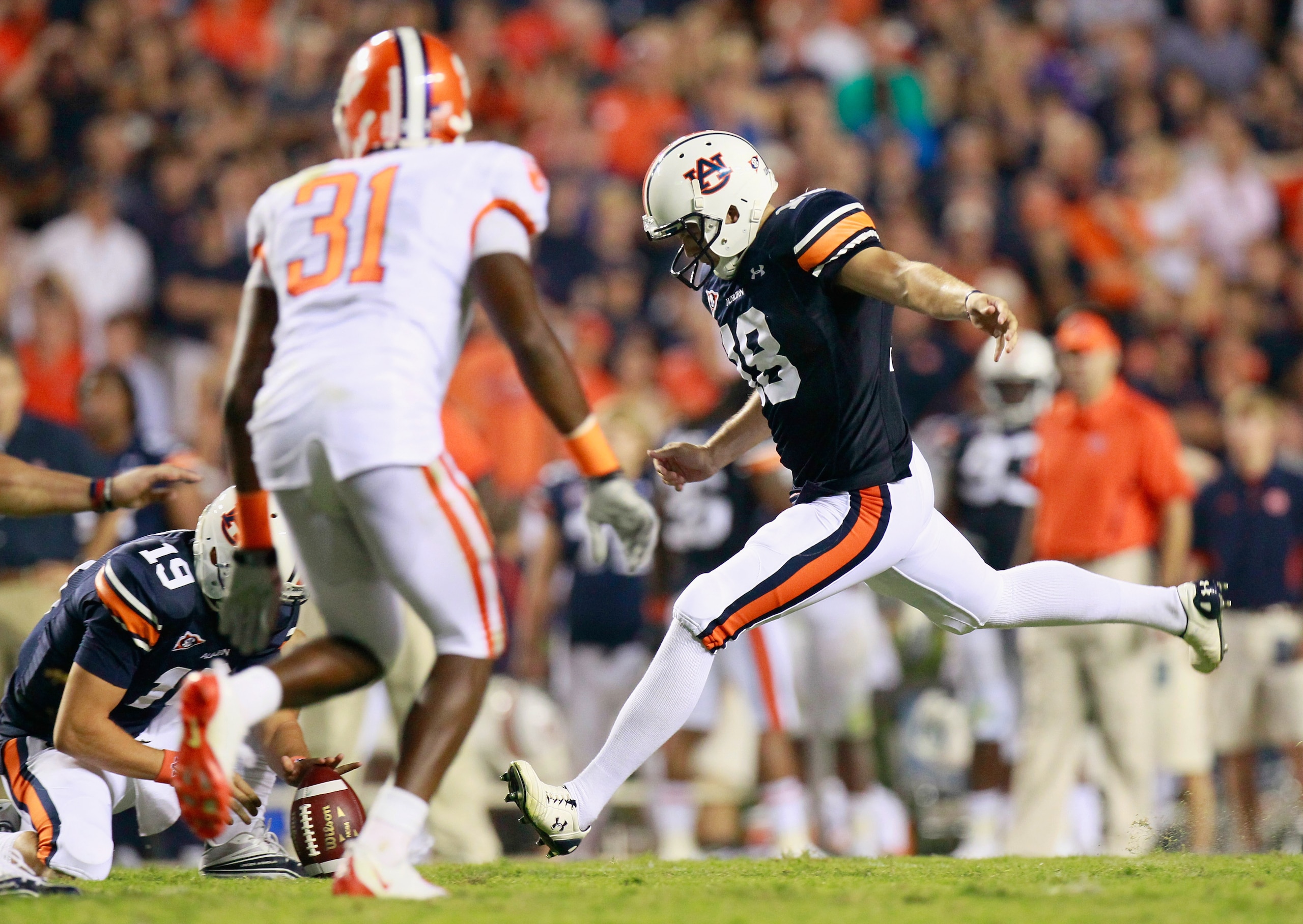 AUBURN, AL - SEPTEMBER 18:  Kicker Wes Byrum #18 of the Auburn Tigers kicks the go-ahead field goal in overtime against the Clemson Tigers at Jordan-Hare Stadium on September 18, 2010 in Auburn, Alabama.  (Photo by Kevin C. Cox/Getty Images)