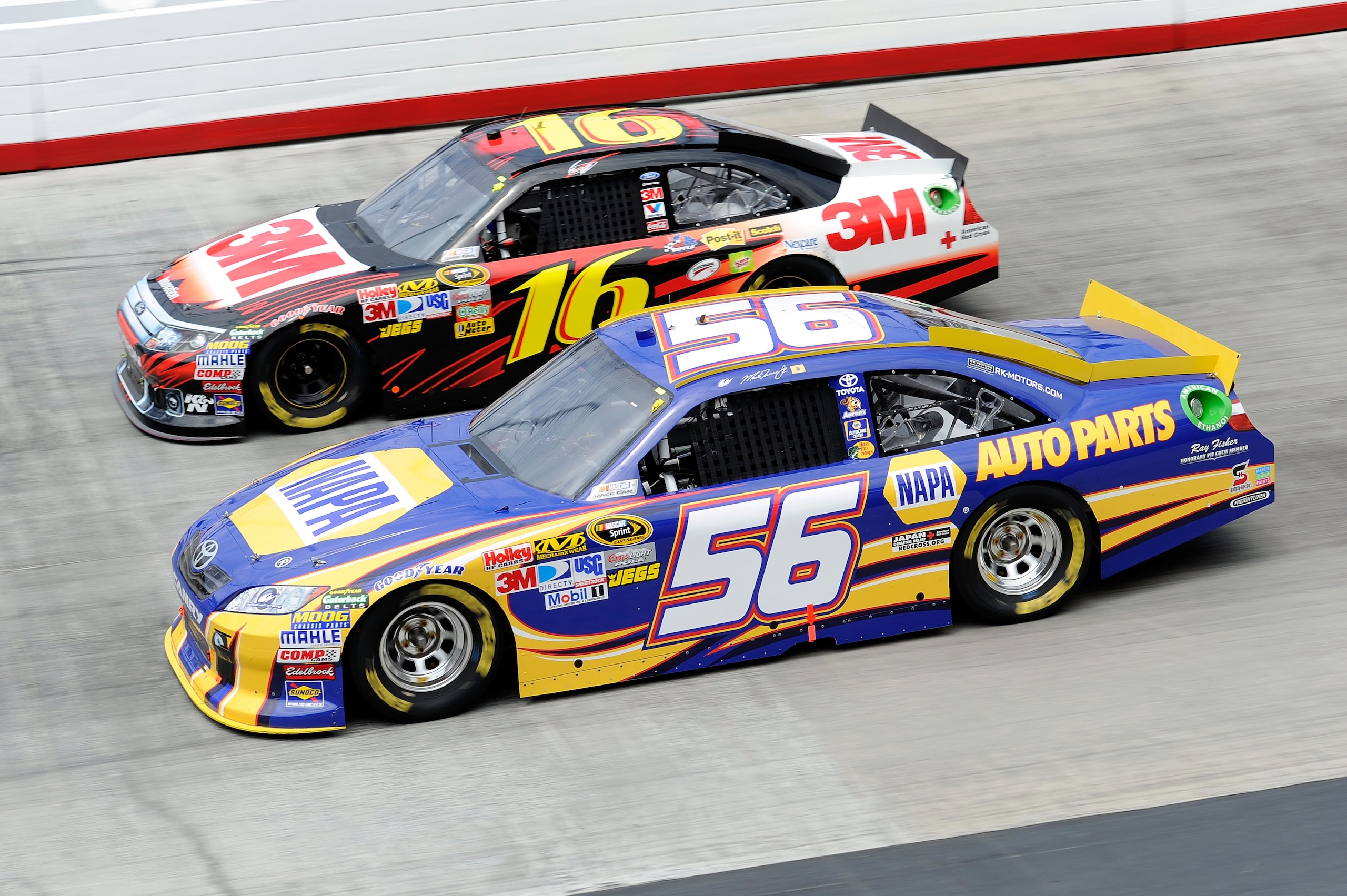 BRISTOL, TN - MARCH 20:  Martin Truex Jr., driver of the #56 NAPA Auto Parts Toyota, races Greg Biffle, driver of the #16 3M Ford, during the NASCAR Sprint Cup Series Jeff Byrd 500 Presented By Food City at Bristol Motor Speedway on March 20, 2011 in Bris
