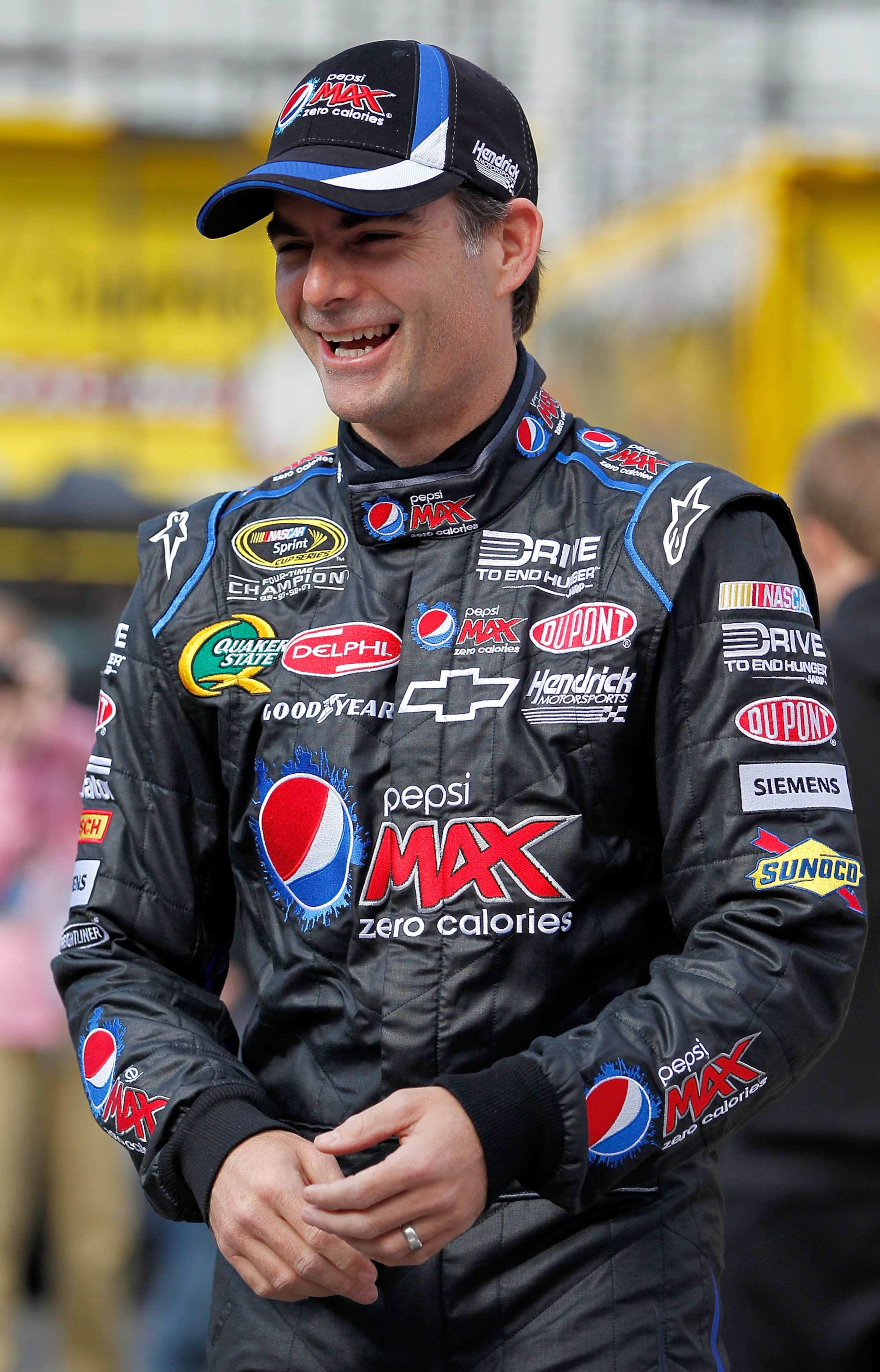 BRISTOL, TN - MARCH 19: Jeff Gordon, driver of the #24 Pepsi Max Chevrolet, smiles prior to practice for the NASCAR Sprint Cup Series Jeff Byrd 500 Presented By Food City at Bristol Motor Speedway on March 19, 2011 in Bristol, Tennessee.  (Photo by Geoff