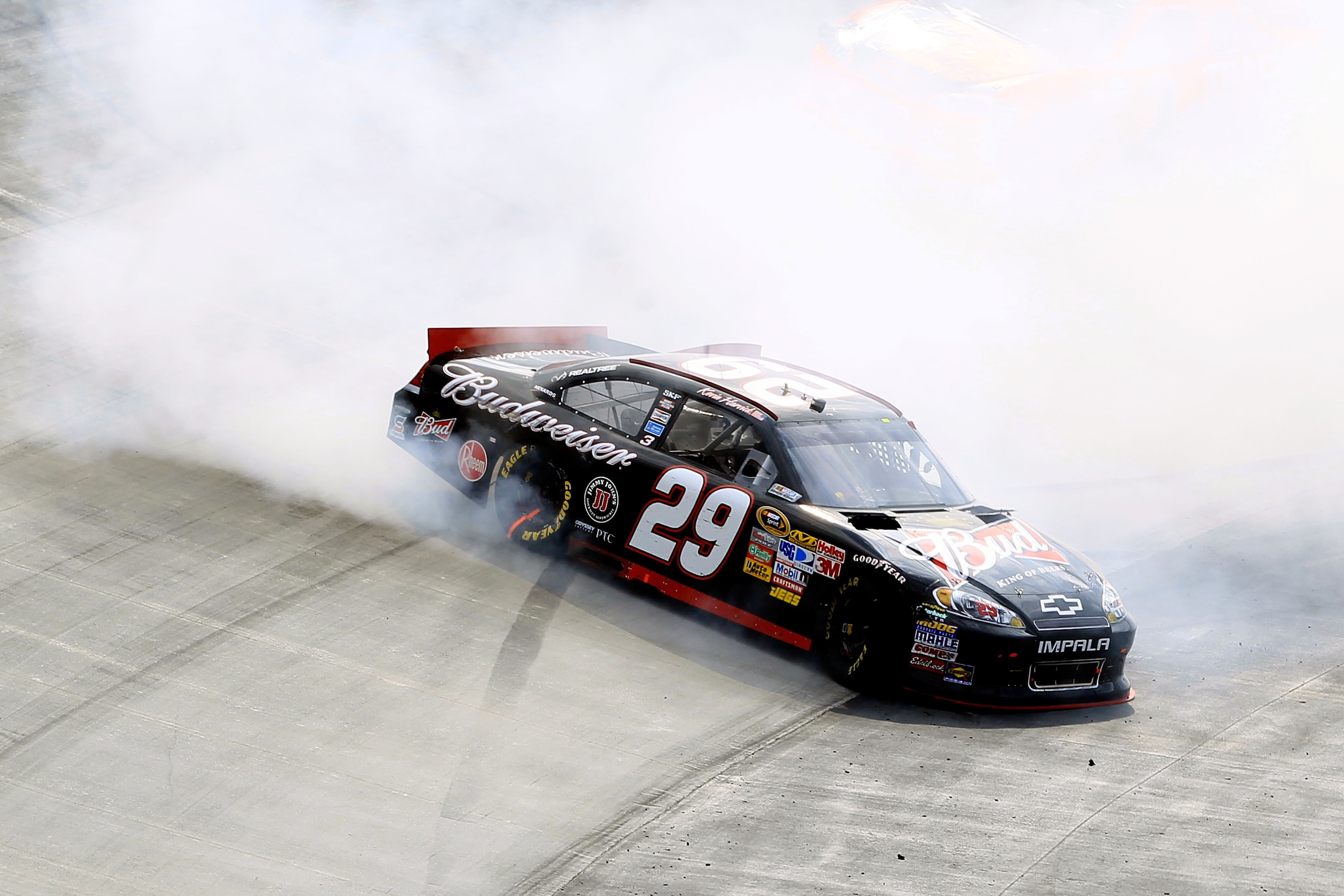 BRISTOL, TN - MARCH 20:  Kevin Harvick, driver of the #29 Budweiser Chevrolet, spins out after an incident in the NASCAR Sprint Cup Series Jeff Byrd 500 Presented By Food City at Bristol Motor Speedway on March 20, 2011 in Bristol, Tennessee.  (Photo by C