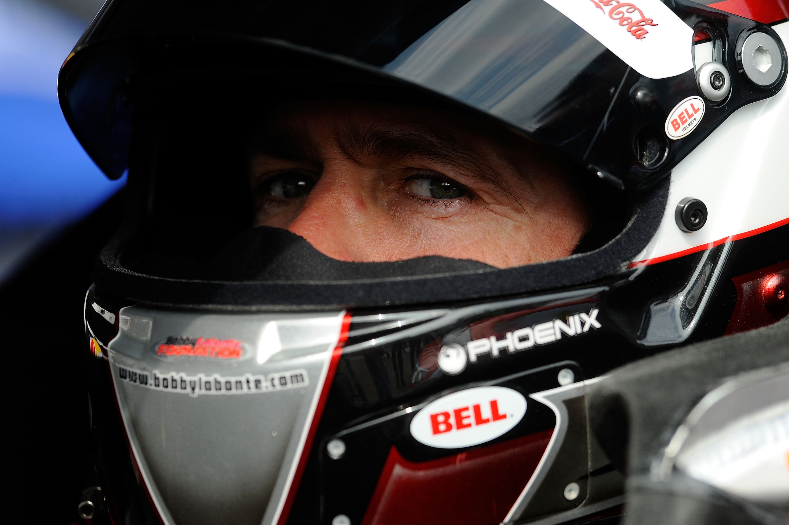 BRISTOL, TN - MARCH 18:  Bobby Labonte, driver of the #47 Bush's Baked Beans Toyota, waits to qualify for the NASCAR Sprint Cup Series Jeff Byrd 500 Presented By Food City at Bristol Motor Speedway on March 18, 2011 in Bristol, Tennessee.  (Photo by Jared