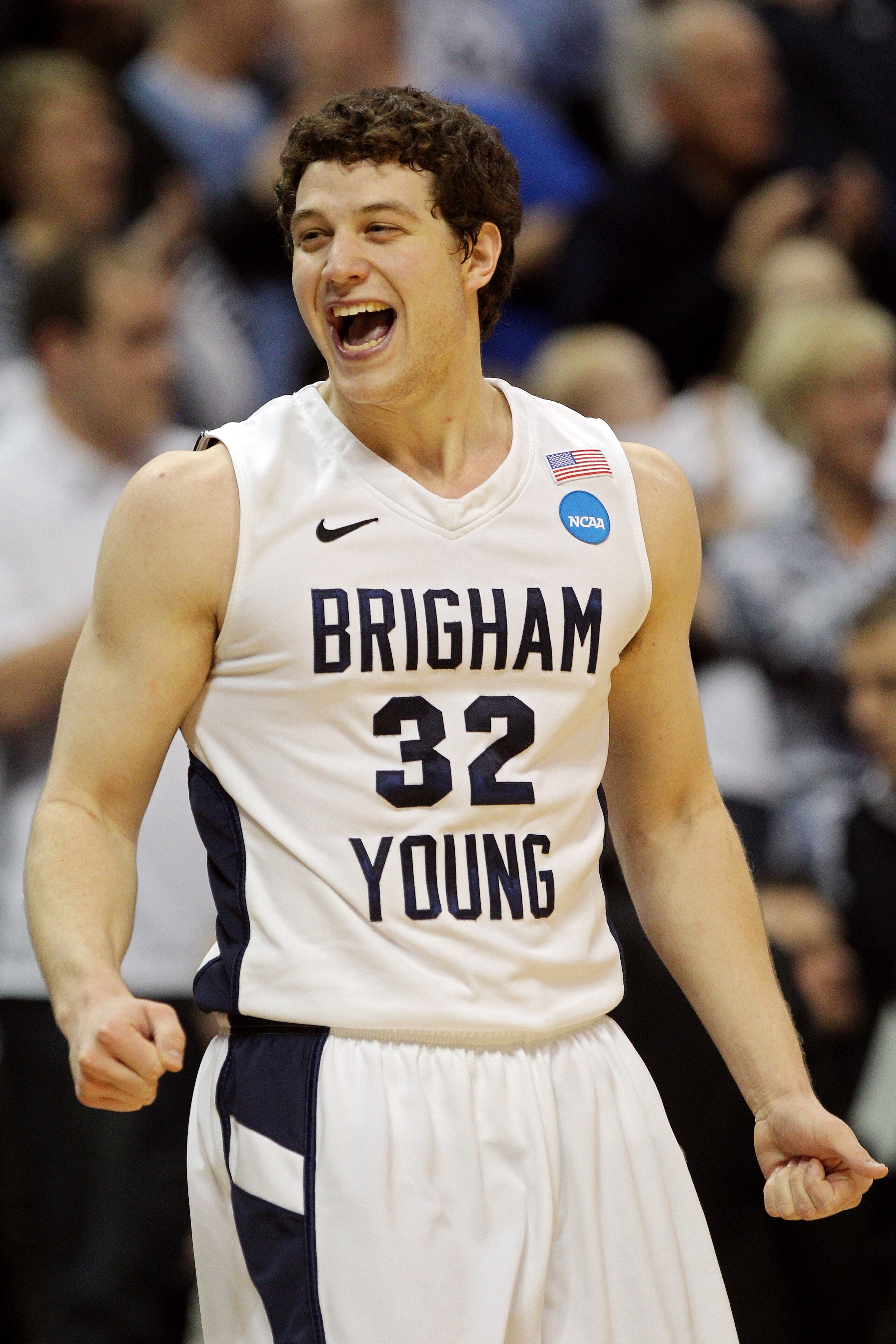 DENVER, CO - MARCH 19: Jimmer Fredette #32 of the Brigham Young Cougars celebrates after defeating the Gonzaga Bulldogs during the third round of the 2011 NCAA men's basketball tournament at Pepsi Center on March 19, 2011 in Denver, Colorado. (Photo by DENVER, CO - MARCH 19: Jimmer Fredette #32 of the Brigham Young Cougars celebrates after defeating the Gonzaga Bulldogs during the third round of the 2011 NCAA men's basketball tournament at Pepsi Center on March 19, 2011 in Denver, Colorado. (Photo by