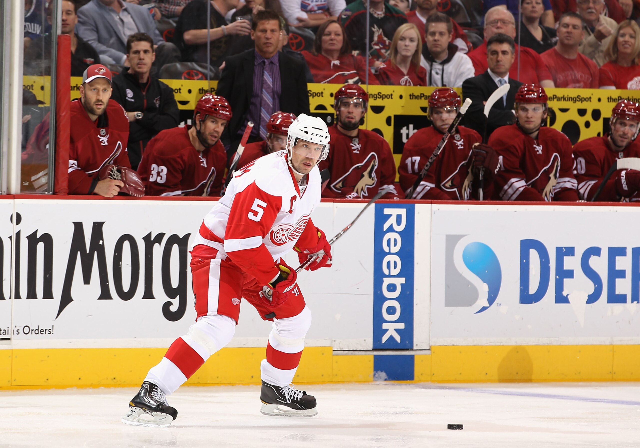 GLENDALE, AZ - MARCH 05:  Nicklas Lidstrom #5  of the Detroit Red Wings shoots the puck during the NHL game against the Phoenix Coyotes at Jobing.com Arena on March 5, 2011 in Glendale, Arizona. The Coyotes defeated the Red Wings 5-4 in an overtime shoot