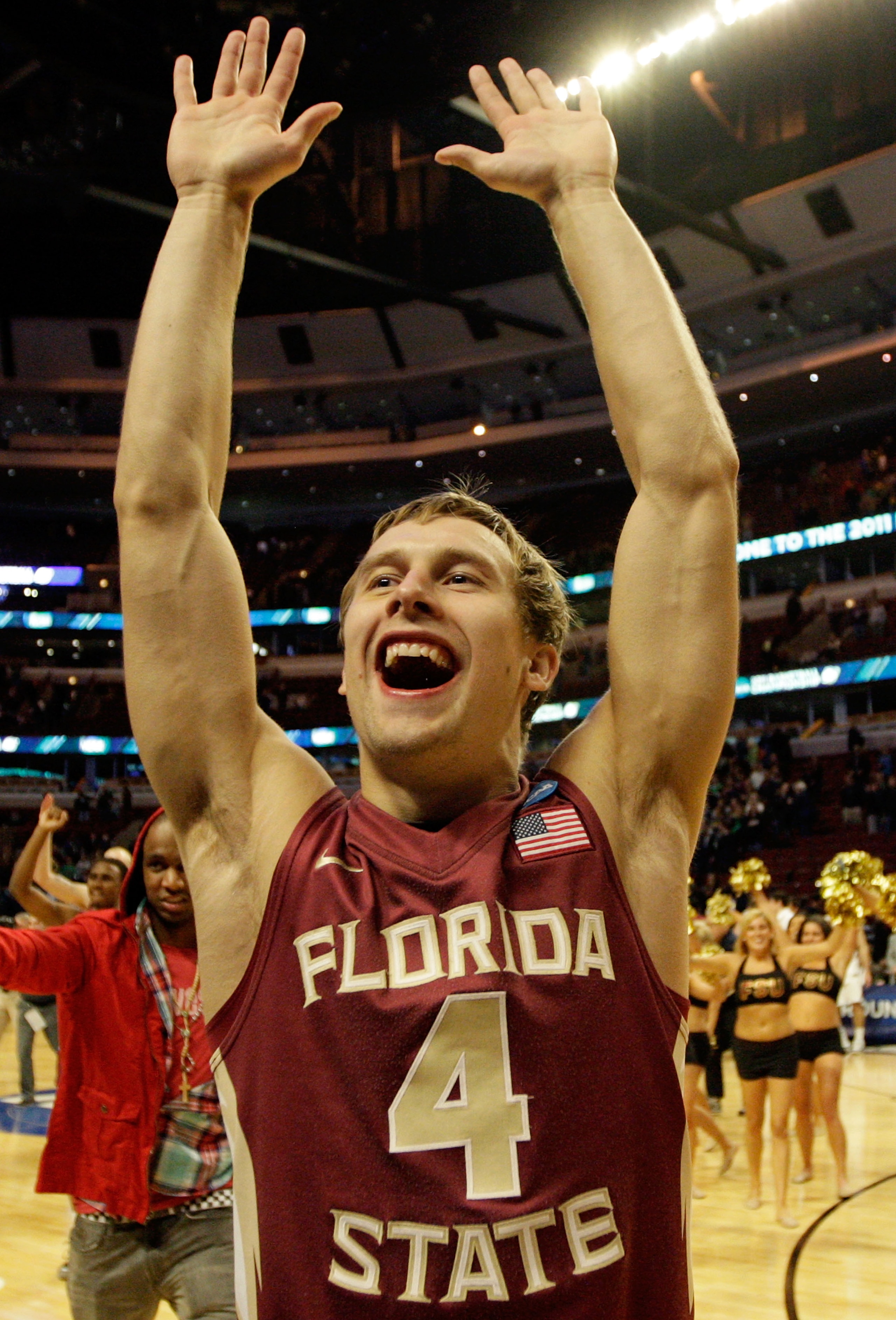CHICAGO, IL - MARCH 20:  Deividas Dulkys #4 of the Florida State Seminoles celebrates after their 71-57 victory over the Notre Dame Fighting Irish during the third round of the 2011 NCAA men's basketball tournament at the United Center on March 20, 2011 i