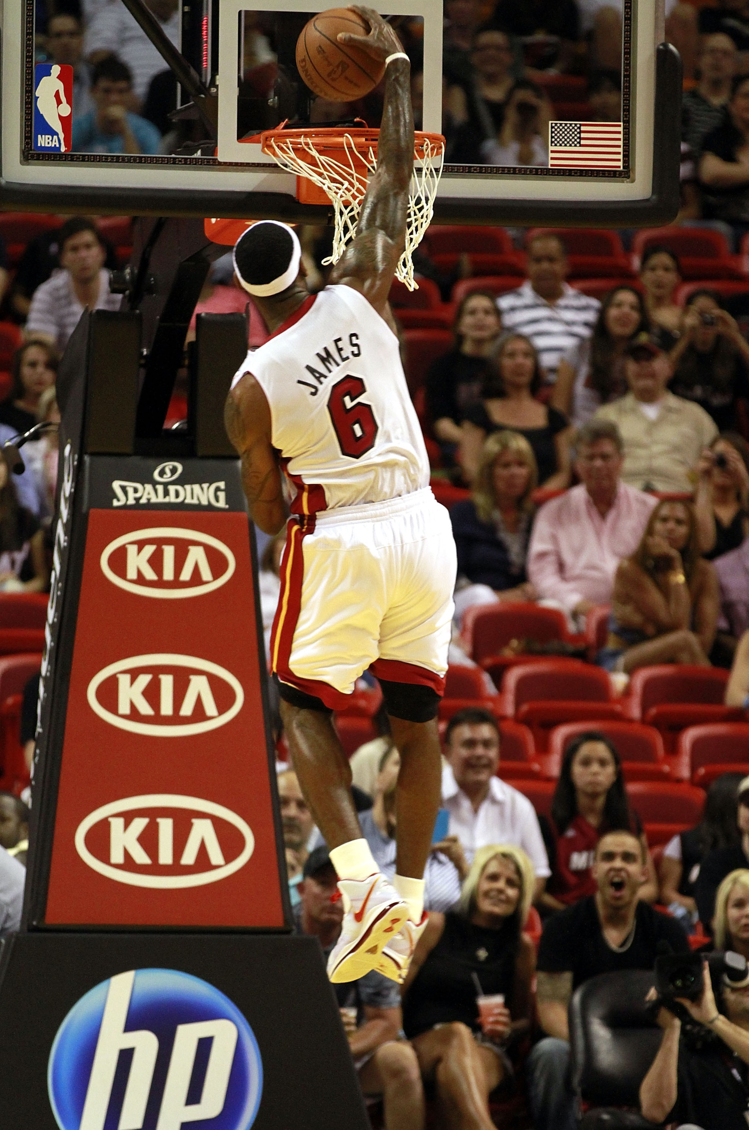 MIAMI, FL - MARCH 19:  Forward LeBron James #6 of the Miami Heat dunks against the Denver Nuggets at American Airlines Arena on March 19, 2011 in Miami, Florida. The Heat defeated the Nuggets 103-98. NOTE TO USER: User expressly acknowledges and agrees th