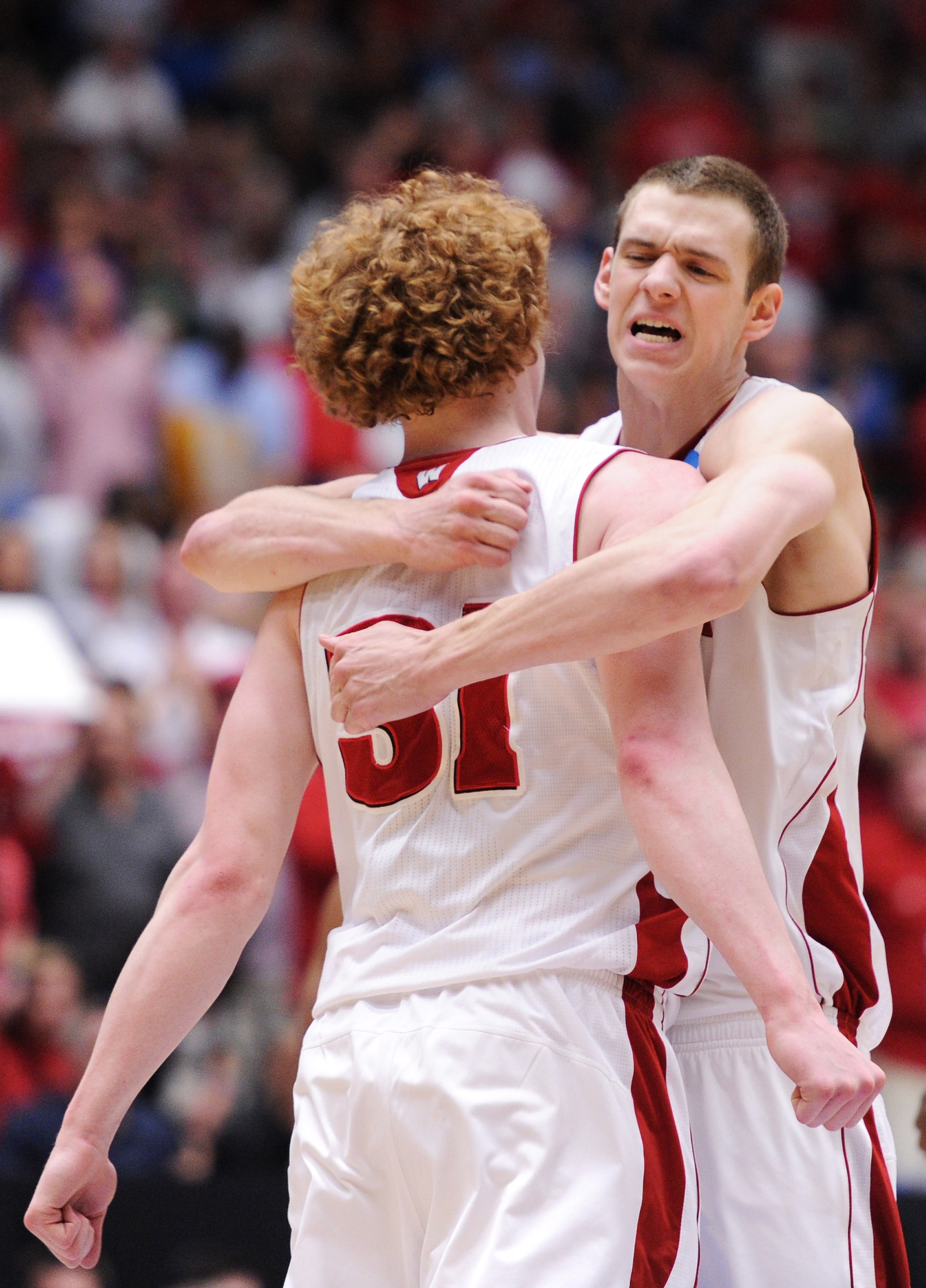 TUCSON, AZ - MARCH 19:  Mike Bruesewitz #31 and Jon Leuer #30 of the Wisconsin Badgers celebrate during their 70 to 65 victory over the Kansas State Wildcats during the third round of the 2011 NCAA men's basketball tournament at McKale Center on March 19,