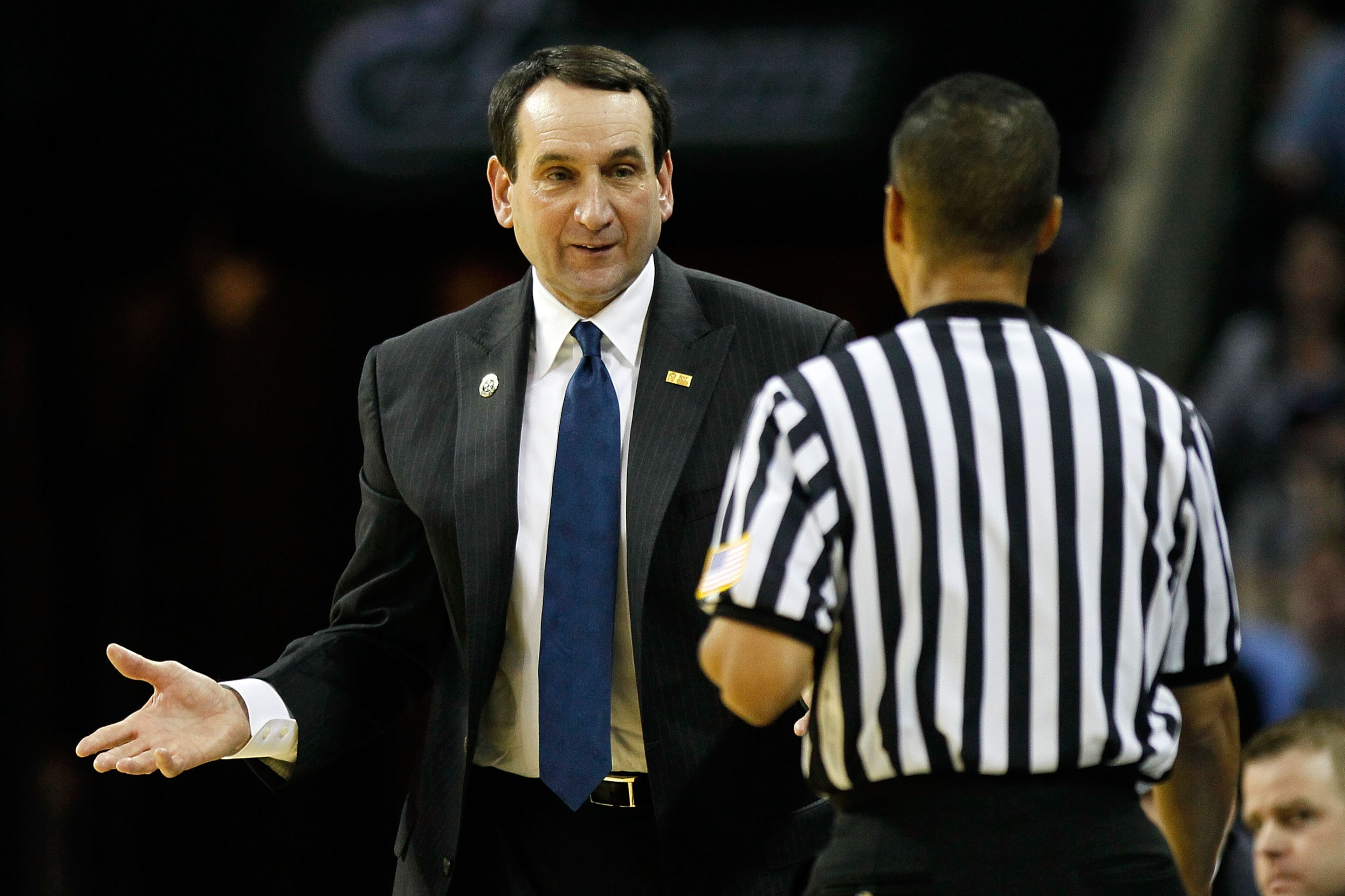 CHARLOTTE, NC - MARCH 20:  Head coach Mike Krzyzewski of the Duke Blue Devils looks over at a referee in the first half while taking on the Michigan Wolverines during the third round of the 2011 NCAA men's basketball tournament at Time Warner Cable Arena