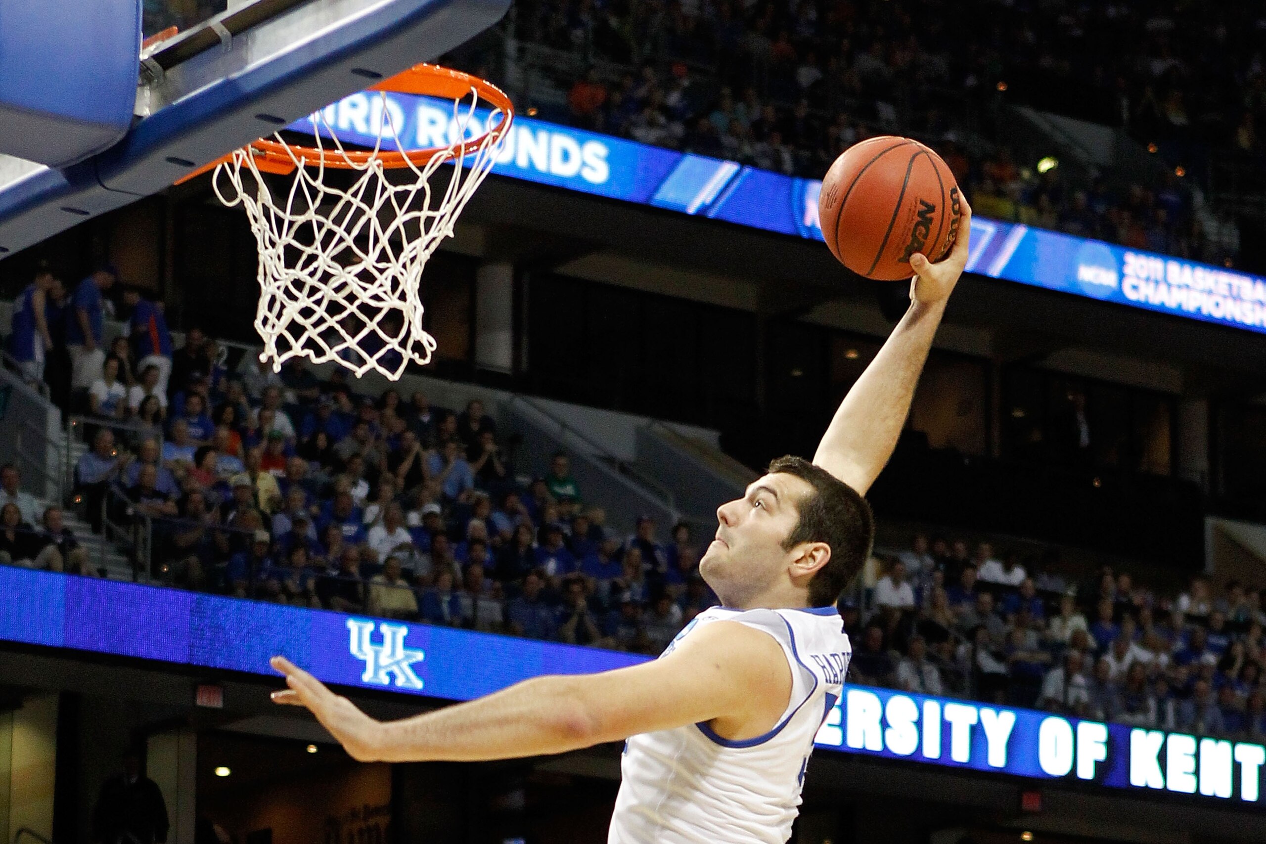TAMPA, FL - MARCH 19:  Josh Harrellson #55 of the Kentucky Wildcats attempts a dunk against the West Virginia Mountaineers during the third round of the 2011 NCAA men's basketball tournament at St. Pete Times Forum on March 19, 2011 in Tampa, Florida.  (P