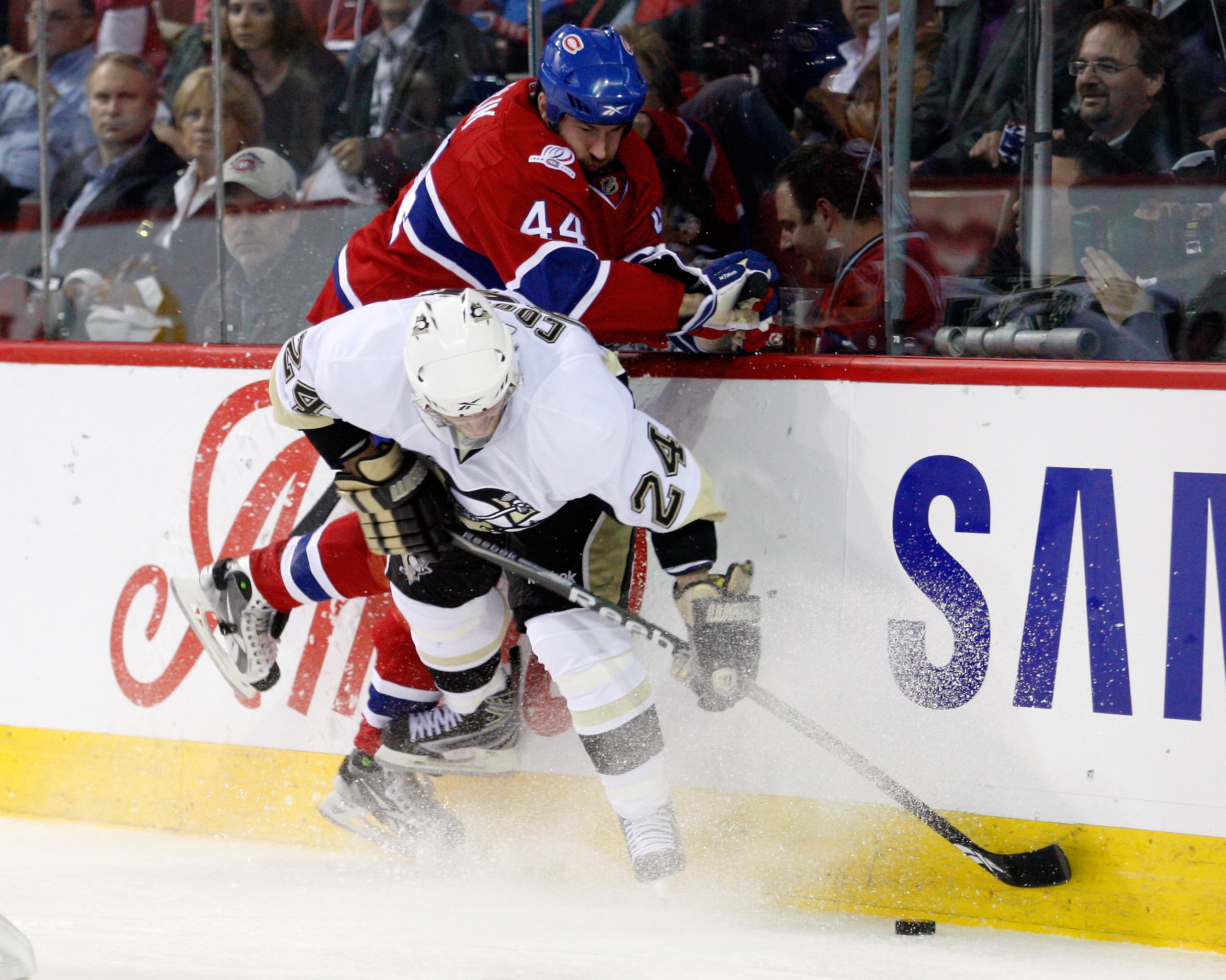 MONTREAL- MAY 10:  Roman Hamrlik #44 of the Montreal Canadiens body checks Matt Cooke #24 of the Pittsburgh Penguins in Game Six of the Eastern Conference Semifinals during the 2010 NHL Stanley Cup Playoffs at the Bell Centre on May 10, 2010 in Montreal, 