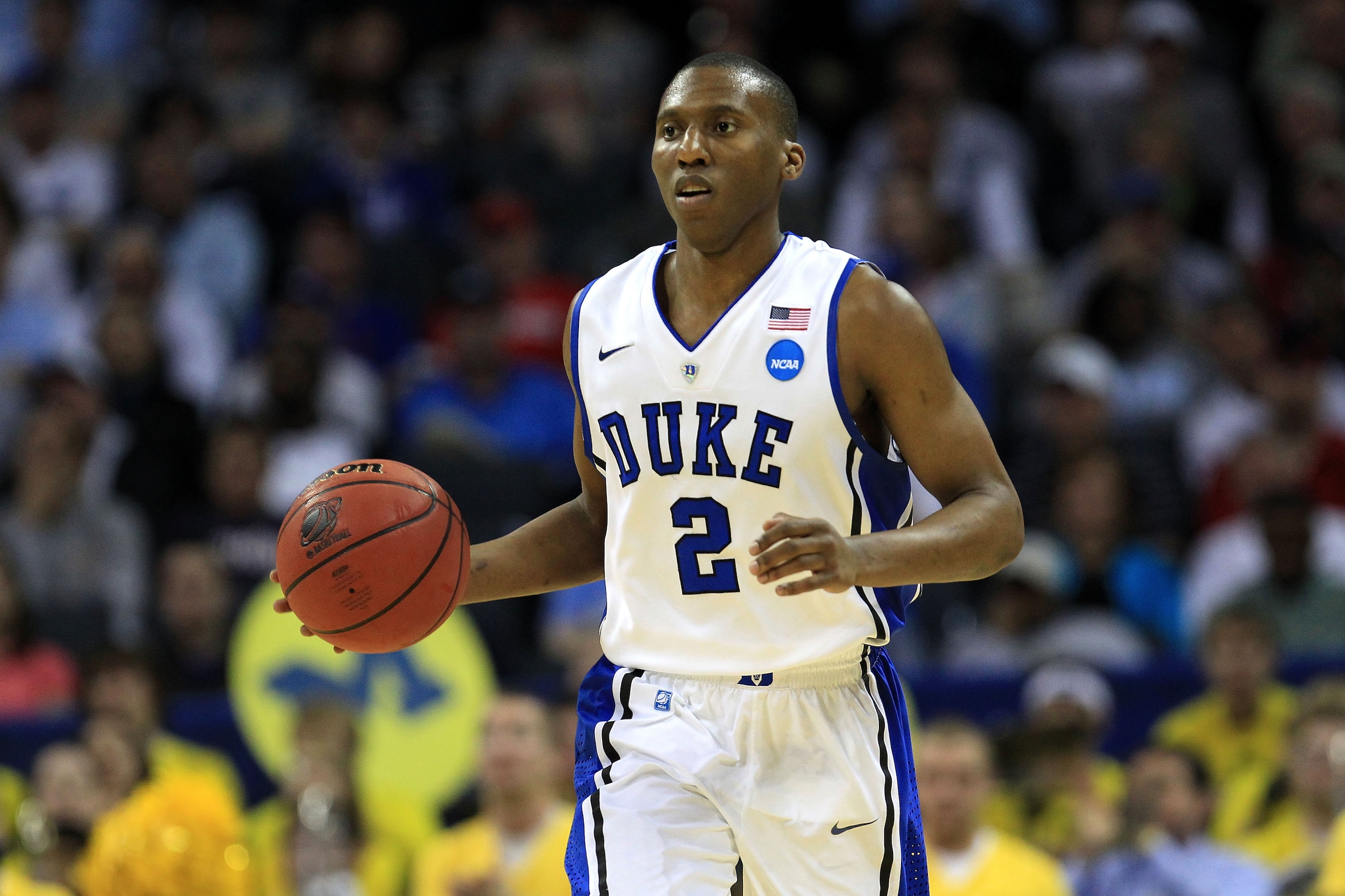 CHARLOTTE, NC - MARCH 20:  Nolan Smith #2 of the Duke Blue Devils moves the ball upcourt while taking on the Michigan Wolverines during the third round of the 2011 NCAA men's basketball tournament at Time Warner Cable Arena on March 20, 2011 in Charlotte,
