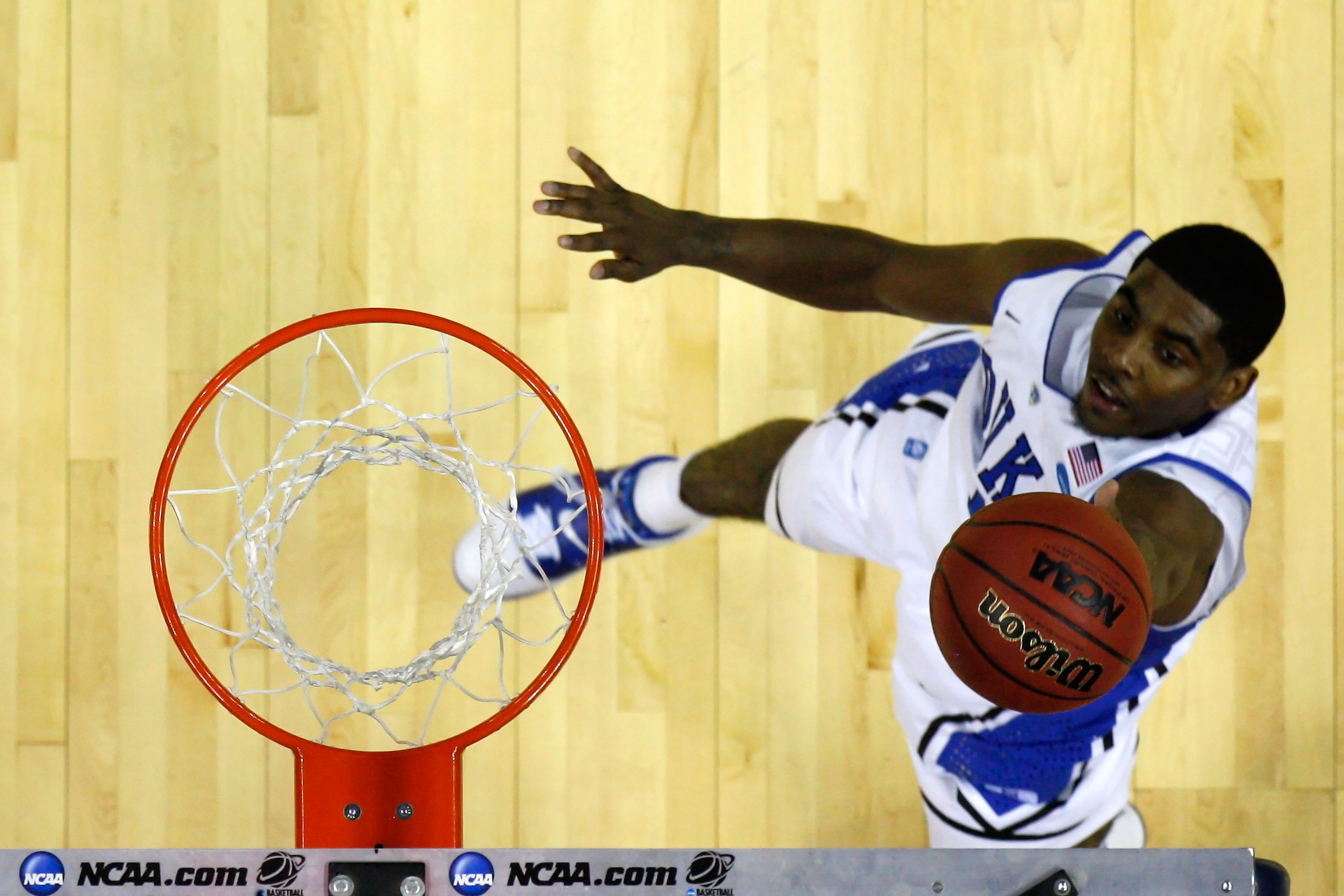 CHARLOTTE, NC - MARCH 18:  Kyrie Irving #1 of the Duke Blue Devils lays the ball up against the Hampton Pirates during the second round of the 2011 NCAA men's basketball tournament at Time Warner Cable Arena on March 18, 2011 in Charlotte, North Carolina.