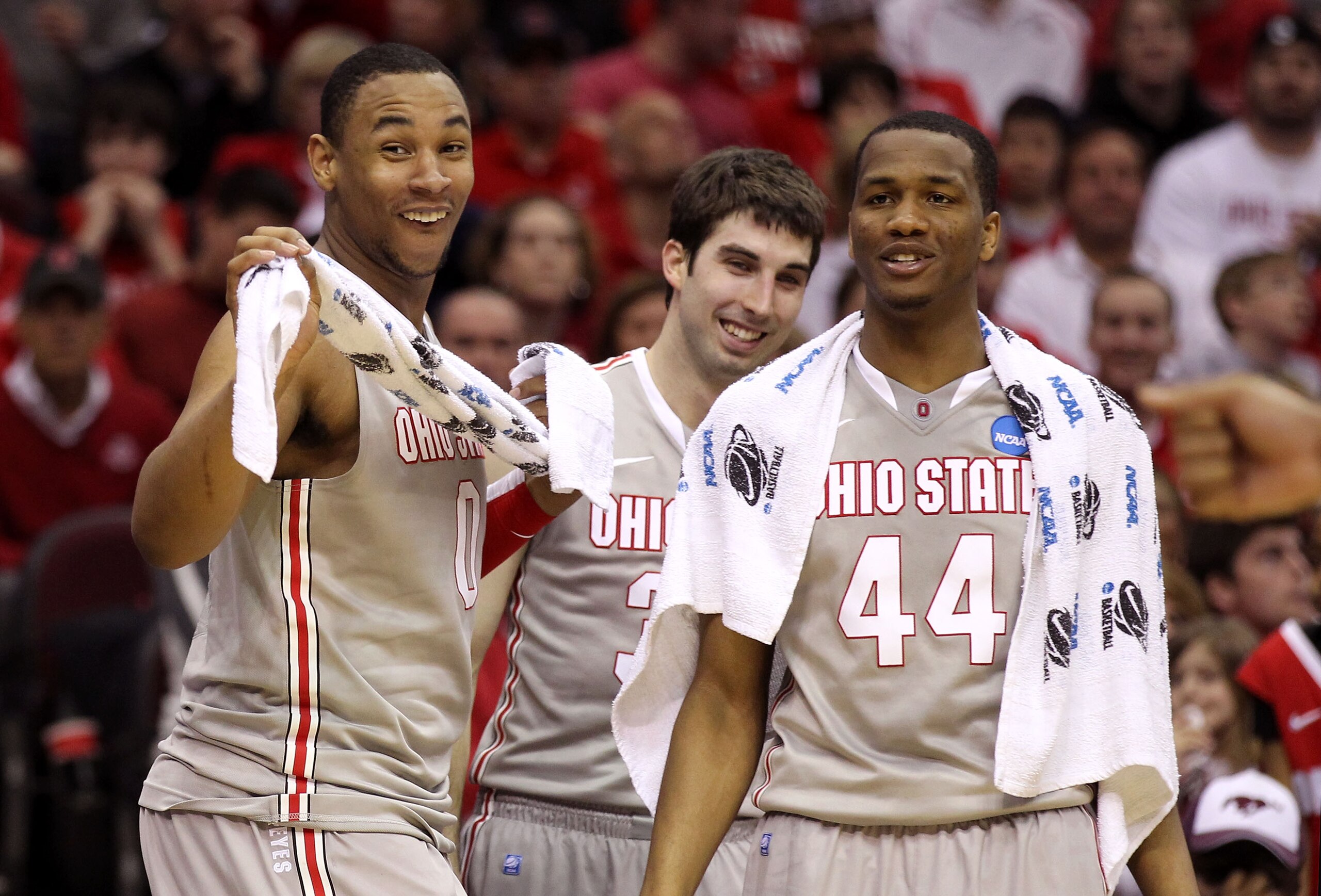 CLEVELAND, OH - MARCH 20: Jared Sullinger #0, Jon Diebler #33 and William Buford #44 of the Ohio State Buckeyes look on from the bench during the second half against the George Mason Patriots during the third of the 2011 NCAA men's basketball tournament a