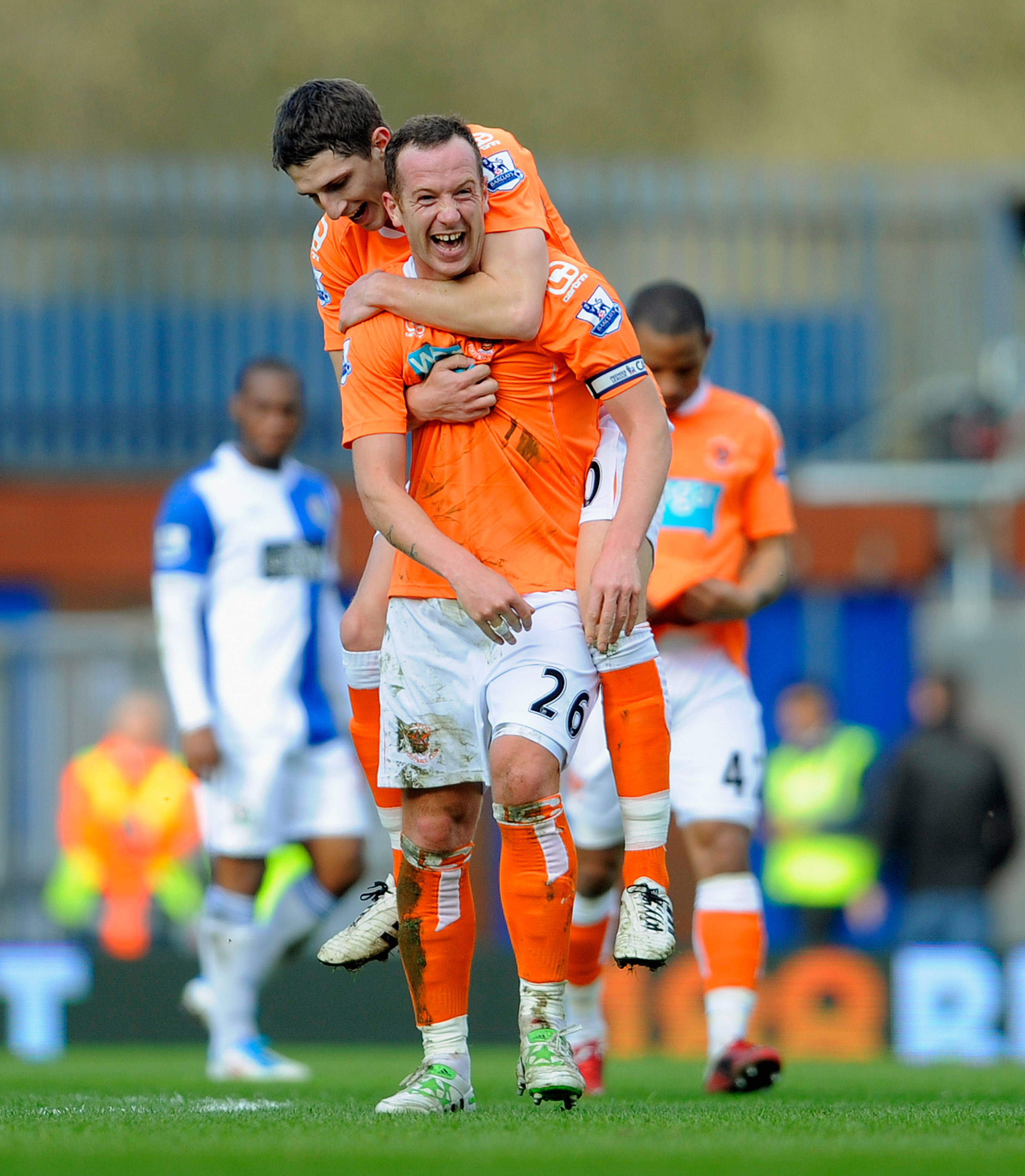BLACKBURN, ENGLAND - MARCH 19: Charlie Adam of Blackpool celebrates with Craig Cathcart after scoring to make it 2-0 during the Barclays Premier League match between Blackburn Rovers and Blackpool at Ewood Park on March 19, 2011 in Blackburn, England.  (P