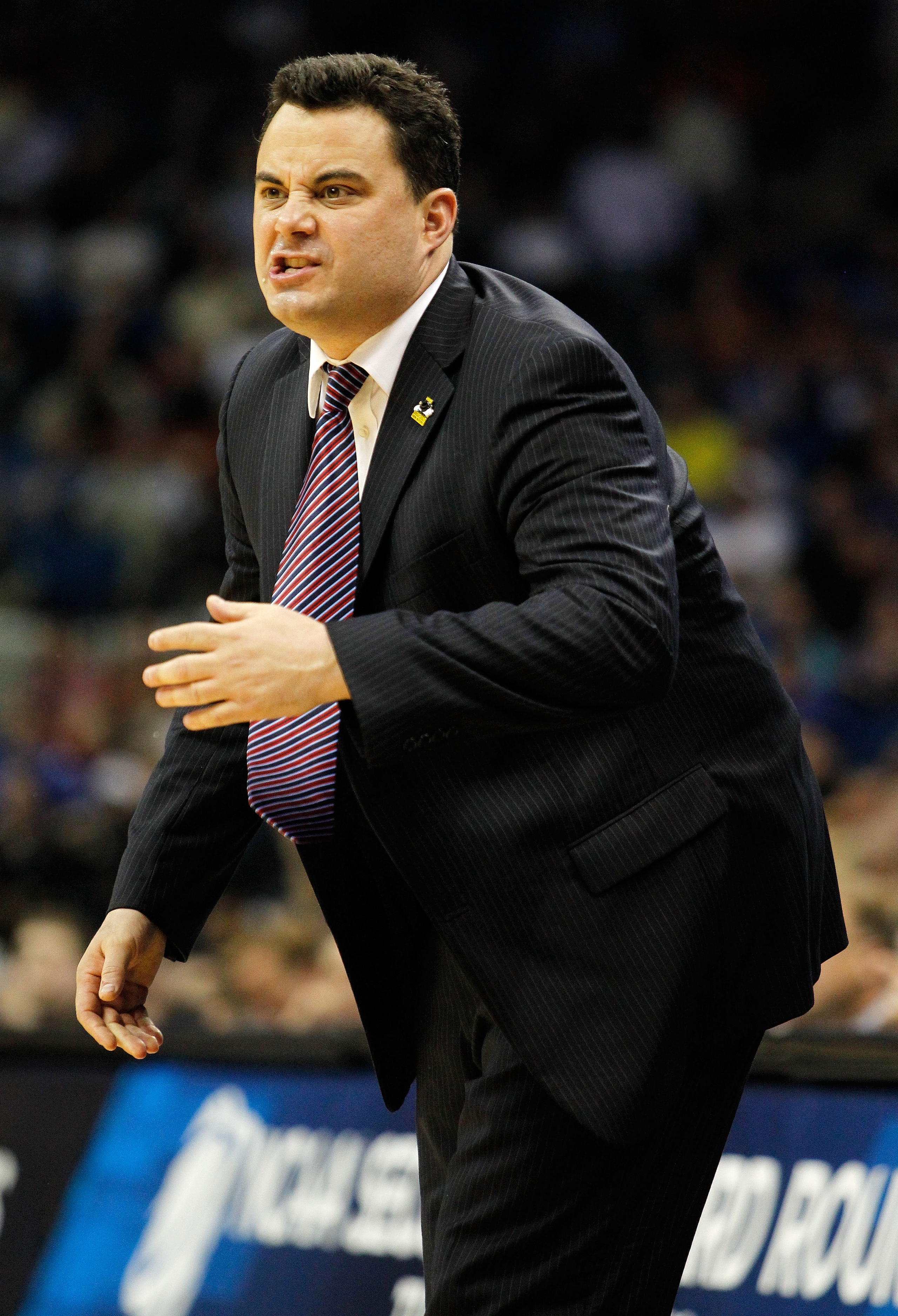 TULSA, OK - MARCH 18:  Head coach Sean Miller of the Arizona Wildcats yells from the sidelines during the second round game against the Memphis Tigers in the 2011 NCAA men's basketball tournament at BOK Center on March 18, 2011 in Tulsa, Oklahoma.  (Photo