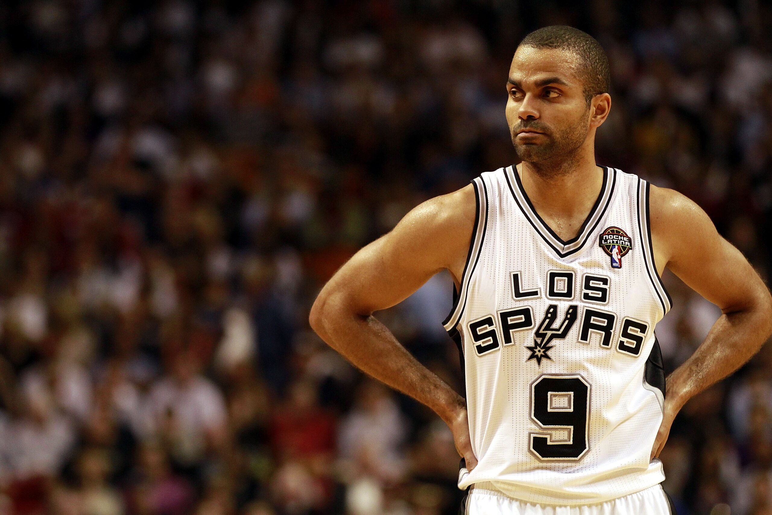 MIAMI - MARCH 14:  Guard Tony Parker #9 of the San Antonio Spurs reacts against the Miami Heat at American Airlines Arena on March 14, 2011 in Miami, Florida. The Heat defeated the Spurs 110-80.  NOTE TO USER: User expressly acknowledges and agrees that,