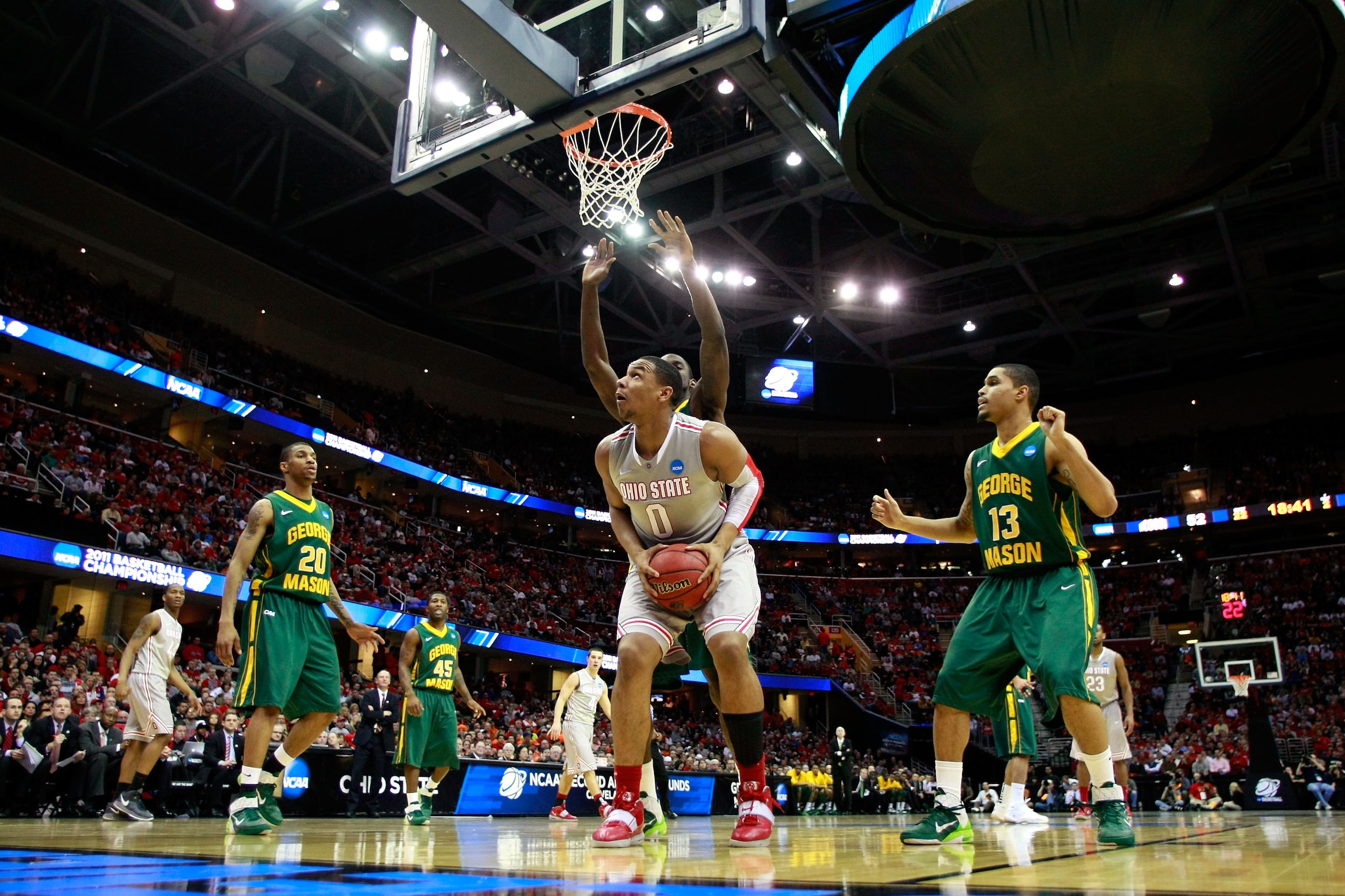 CLEVELAND, OH - MARCH 20: Jared Sullinger #0 of the Ohio State Buckeyes handles the ball against the George Mason Patriots during the third of the 2011 NCAA men's basketball tournament at Quicken Loans Arena on March 20, 2011 in Cleveland, Ohio.  (Photo b