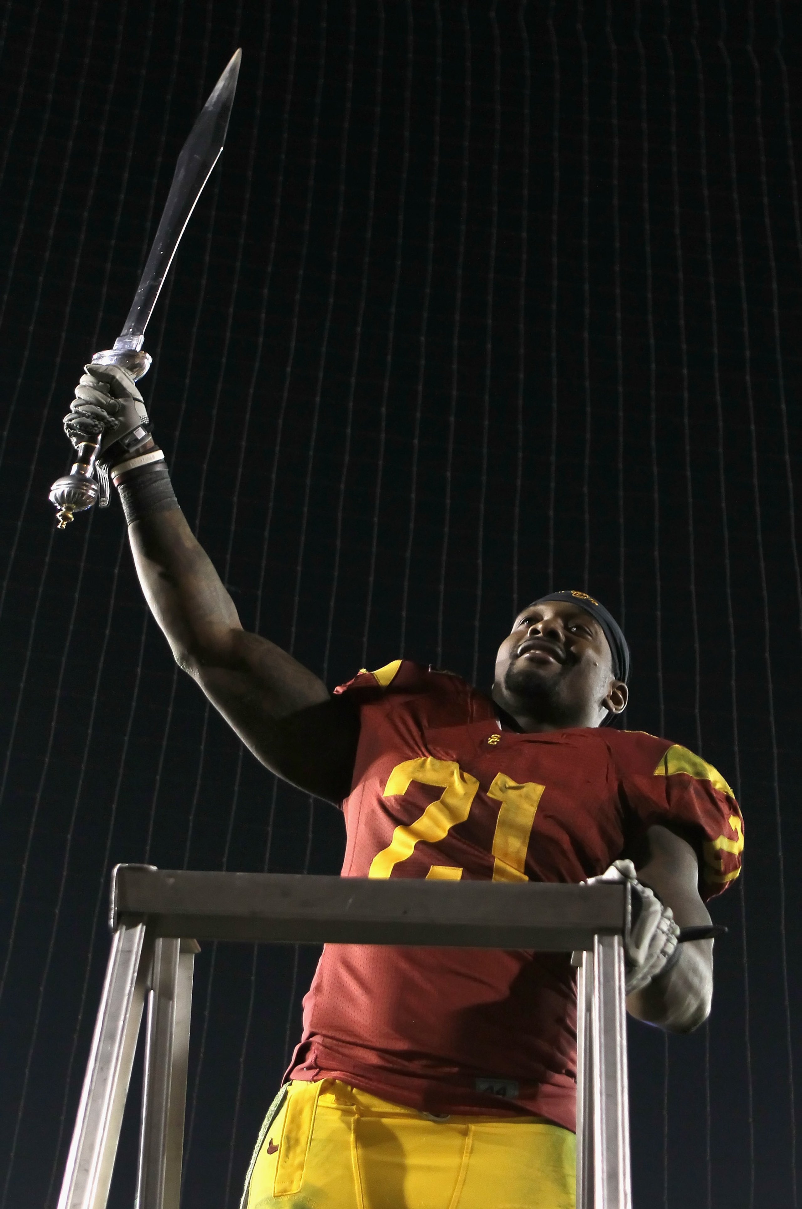 PASADENA, CA - DECEMBER 04:  Running back Allen Bradford #21 of the USC Trojans celebrates following his teams victory over the UCLA Bruins at the Rose Bowl on December 4, 2010 in Pasadena, California.  USC defeated UCLA 28-14.  (Photo by Jeff Gross/Getty