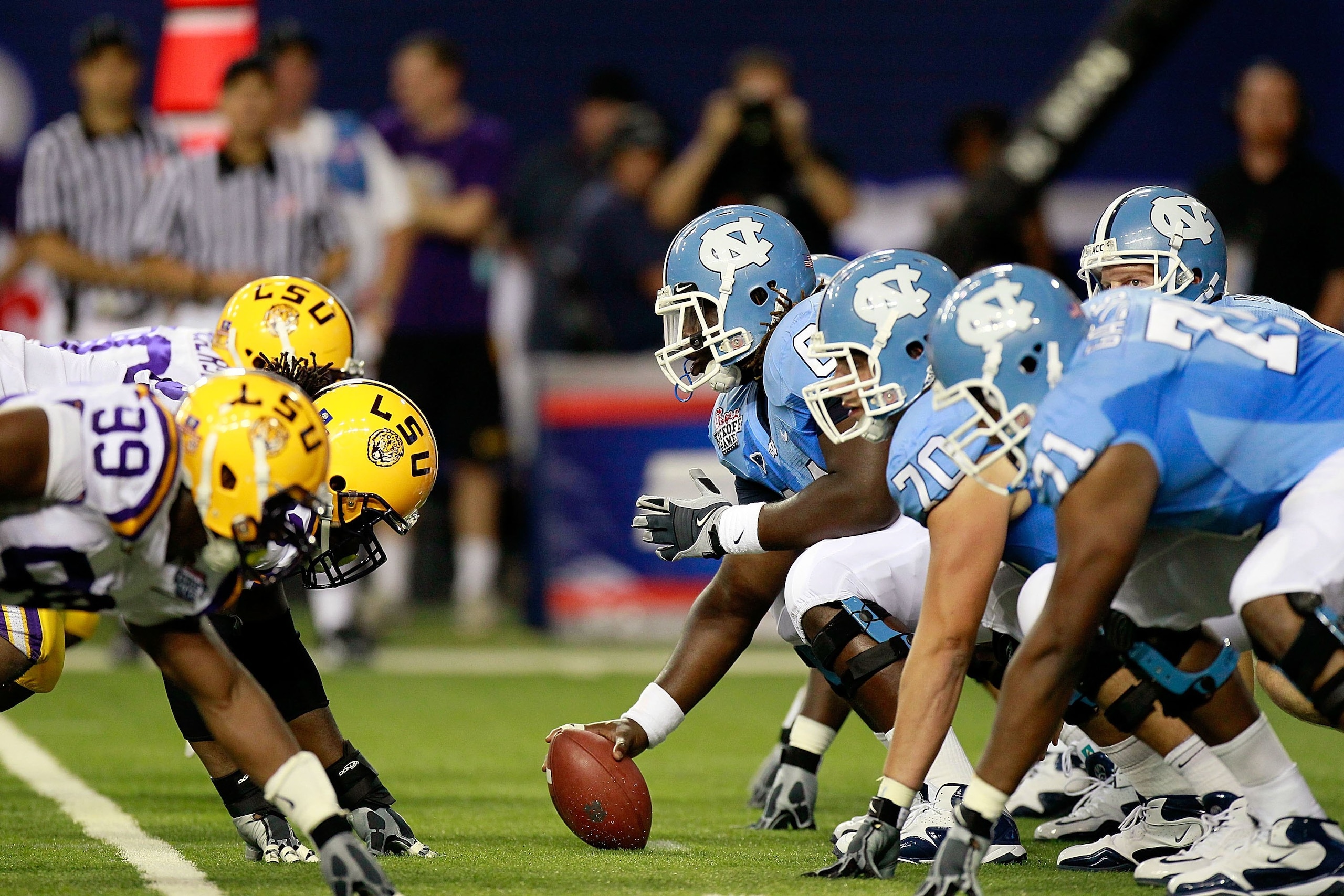 ATLANTA - SEPTEMBER 04:  The offense of the North Carolina Tar Heels against the defense of the LSU Tigers during the Chick-fil-A Kickoff Game at Georgia Dome on September 4, 2010 in Atlanta, Georgia.  (Photo by Kevin C. Cox/Getty Images)