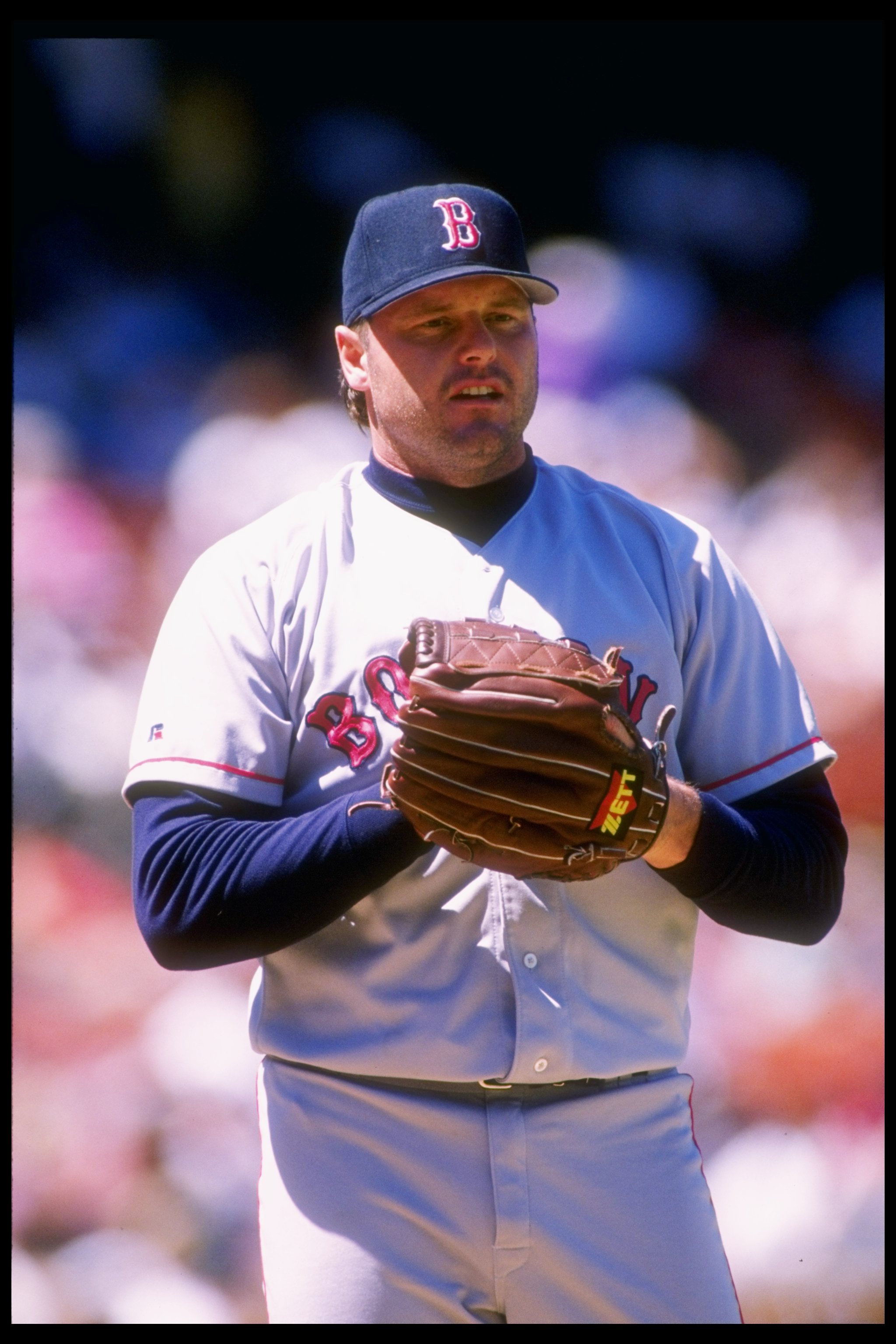 27 Aug 1995: Pitcher Roger Clemens of the Boston Red Sox looks on during a game against the Oakland Athletics at the Oakland Alameda Coliseum in Oakland, California. The Red Sox won the game 4-1.