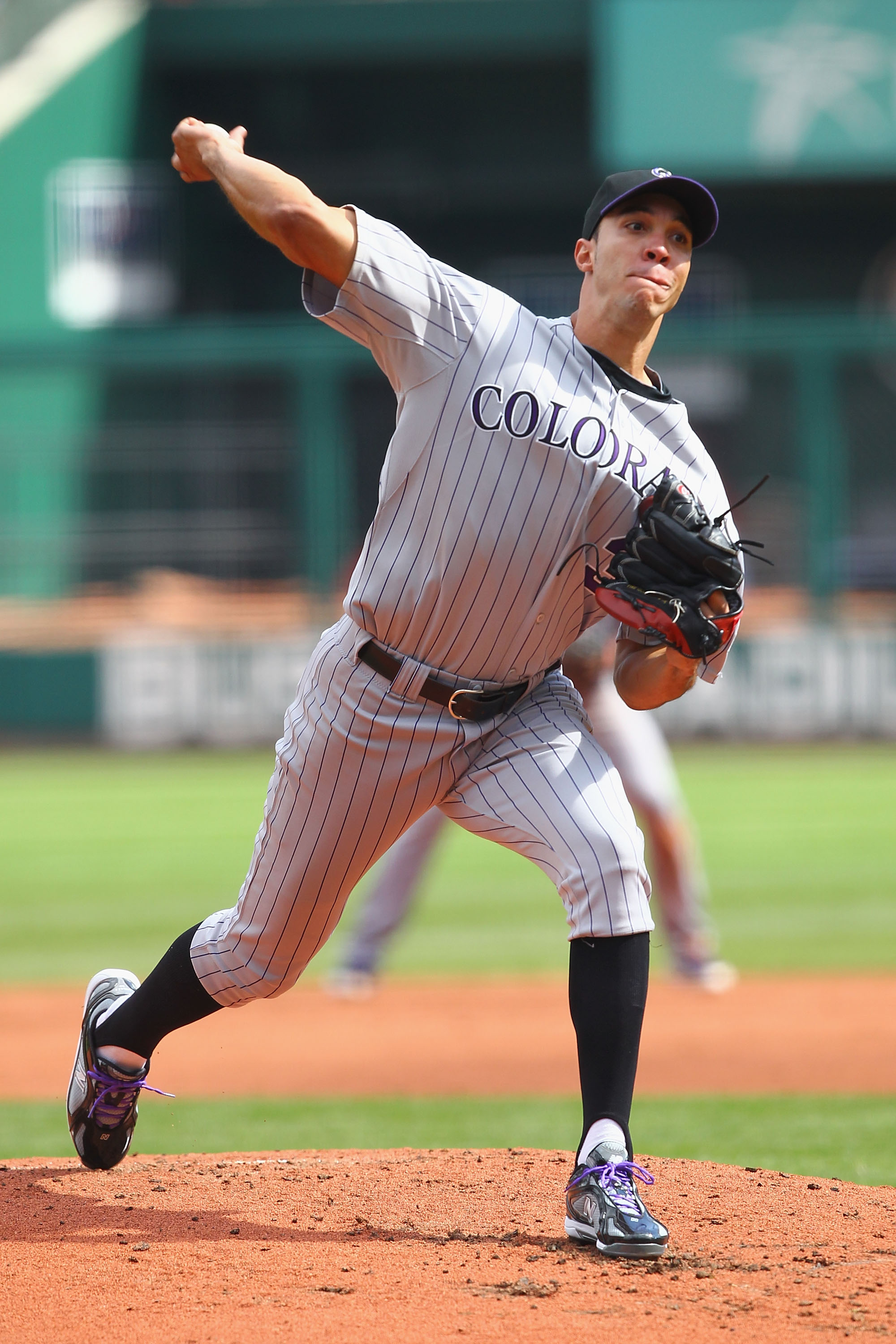 ST. LOUIS - OCTOBER 2: Starter Ubaldo Jimenez #38 of the Colorado Rockies pitches against the St. Louis Cardinals at Busch Stadium on October 2, 2010 in St. Louis, Missouri.  The Cardinals beat the Rockies 1-0 in 11 innings.  (Photo by Dilip Vishwanat/Get