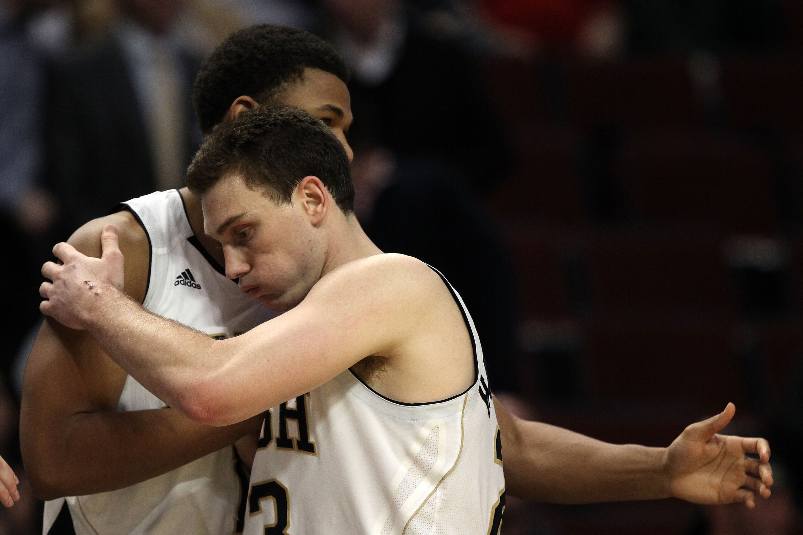 CHICAGO, IL - MARCH 20: Ben Hansbrough #23 of the Notre Dame Fighting Irish hugs Tyrone Nash #1 of the Notre Dame Fighting Irish after losing to the Florida State Seminoles during the third round of the 2011 NCAA men's basketball tournament at the United