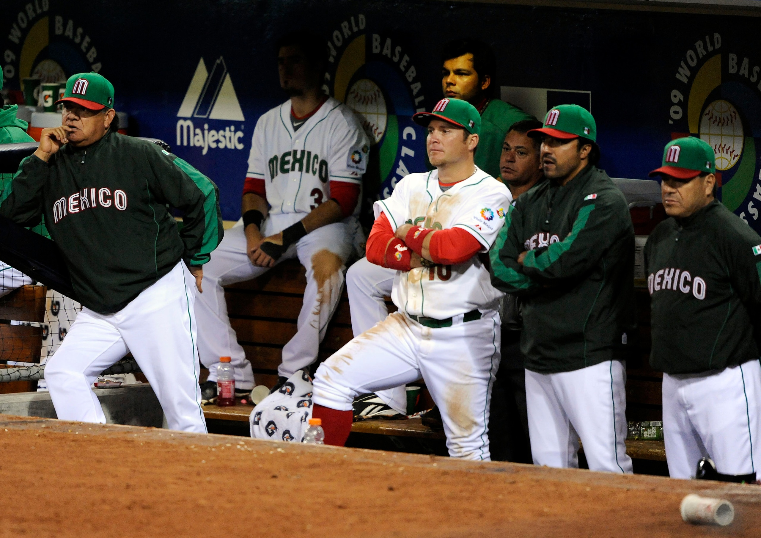 SAN DIEGO - MARCH 16:(L-R) Mexican Bench Coach Fernando Valenzuela stands in the dugout with Jorge Cantu #3, Karim Garcia #10, Manager Vinny Castilla and pitching coach Teddy Higuera after losing to Cuba 7-4 during the 2009 World Baseball Classic Round 2