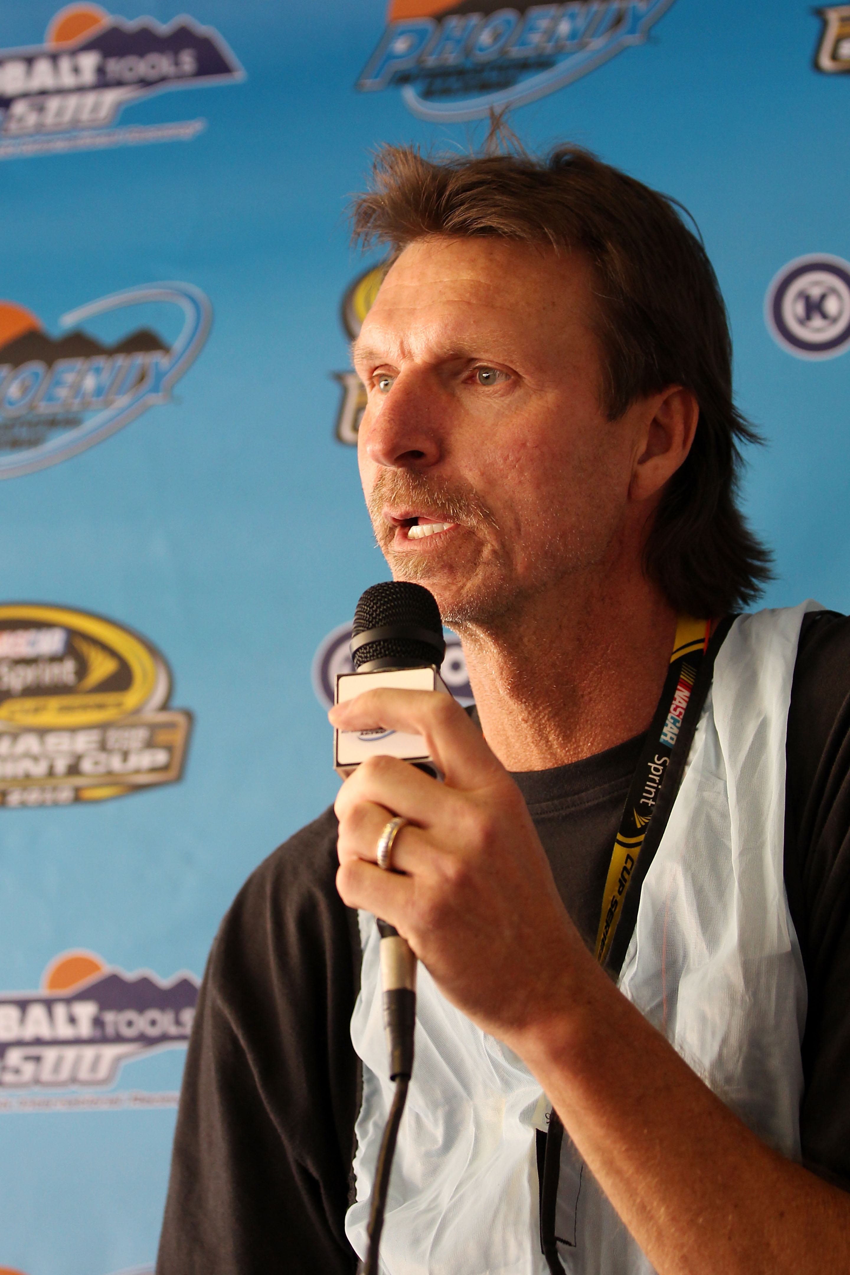 AVONDALE, AZ - NOVEMBER 13:  Former MLB pitcher Randy Johnson speaks at a press conference during practice for the NASCAR Sprint Cup Series Kobalt Tools 500 at Phoenix International Raceway on November 13, 2010 in Avondale, Arizona.  (Photo by Christian P