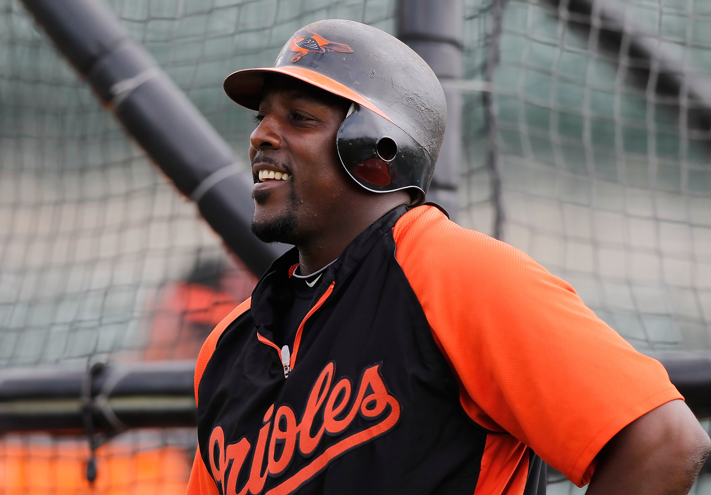 SARASOTA, FL - MARCH 05:  Designated hitter Vladimir Guerrero #27 of the Baltimore Orioles smiles during batting practice just before the start of the Grapefruit League Spring Training Game against the Boston Red Sox at Ed Smith Stadium on March 5, 2011 i