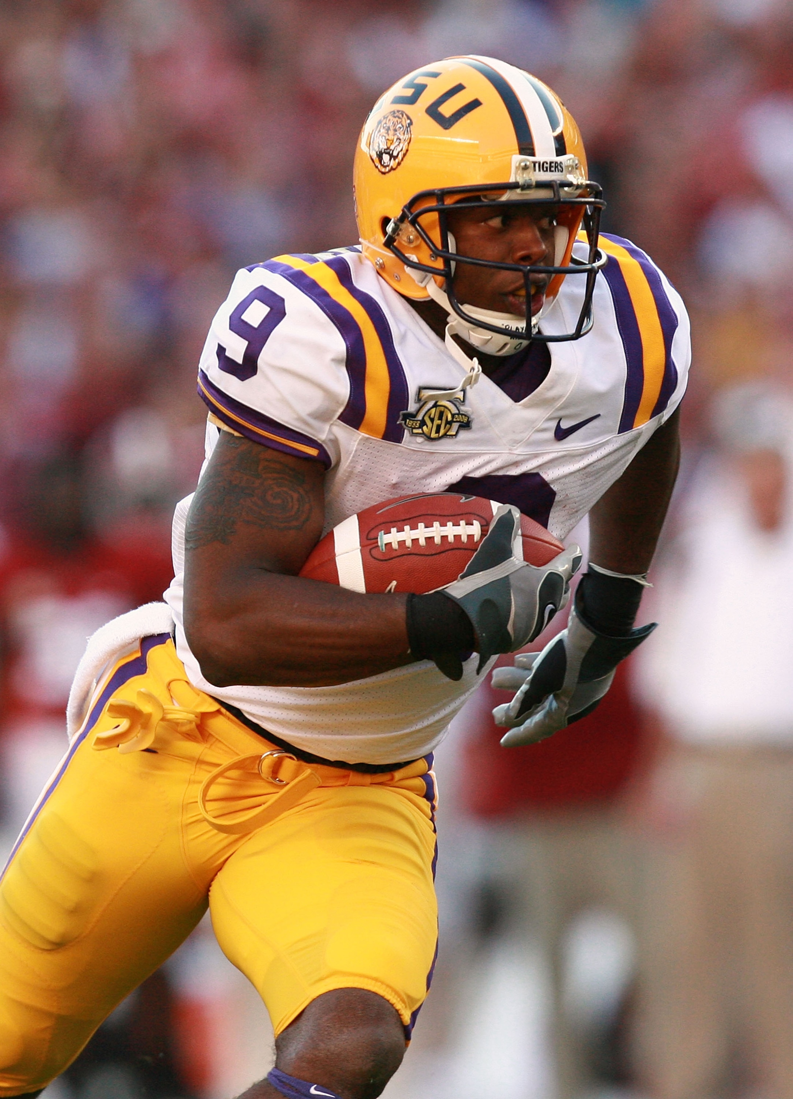 TUSCALOOSA, AL - NOVEMBER 03:  Wide receiver Early Doucet #9 of the LSU Tigers runs for a touchdown in the first quarter against the Alabama Crimson Tide at Bryant-Denny Stadium on November 3, 2007 in Tuscaloosa, Alabama.  (Photo by Doug Benc/Getty Images