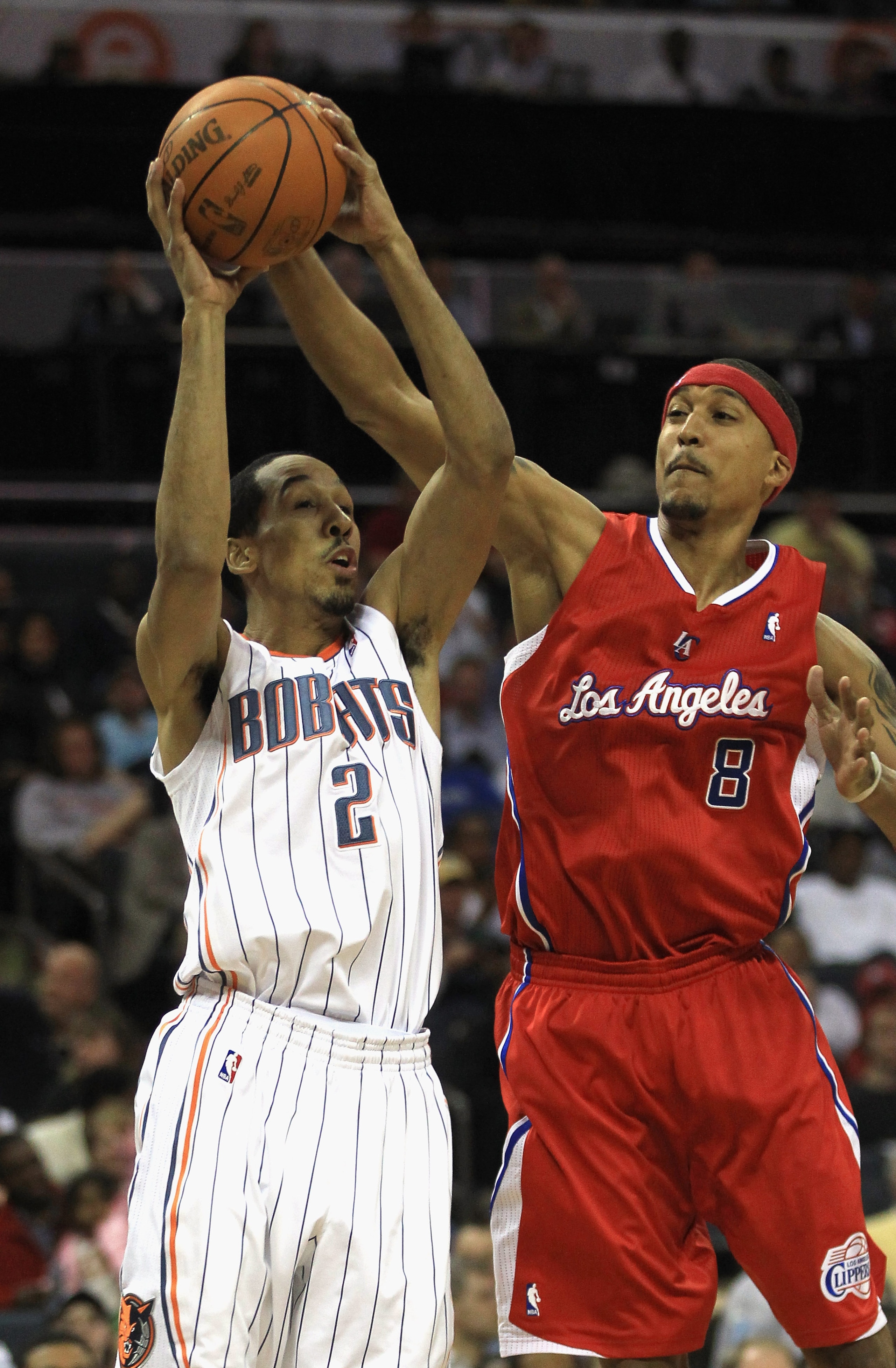 CHARLOTTE, NC - MARCH 07:  Jamario Moon #8 of the Los Angeles Clippers tries to stop Shaun Livingston #2 of the Charlotte Bobcats during their game at Time Warner Cable Arena on March 7, 2011 in Charlotte, North Carolina. NOTE TO USER: User expressly ackn