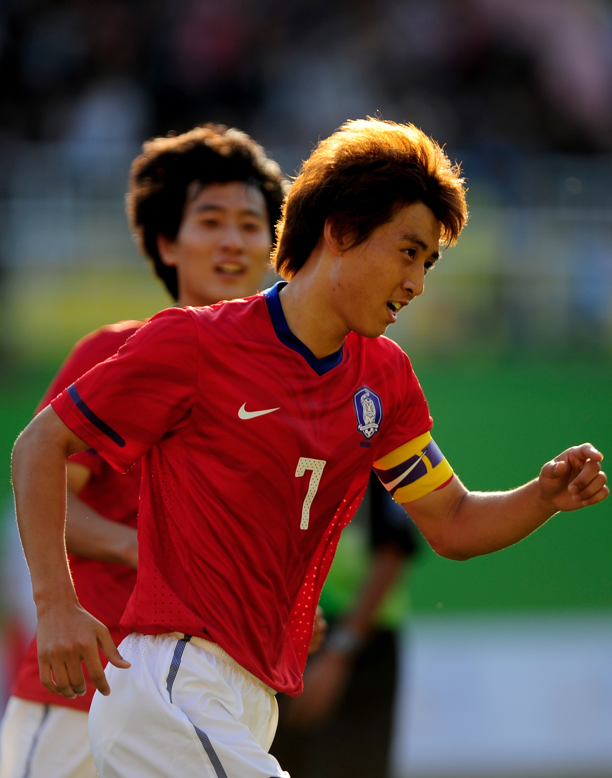 GUANGZHOU, CHINA - NOVEMBER 10:  Ja Cheol Koo of South Korea celebrates scoring the opening goal during the Men's Football Group C first round match between South Korea and Jordan ahead of the 16th Asian Games Guangzhou 2010 at Yuexiu Stadium on November