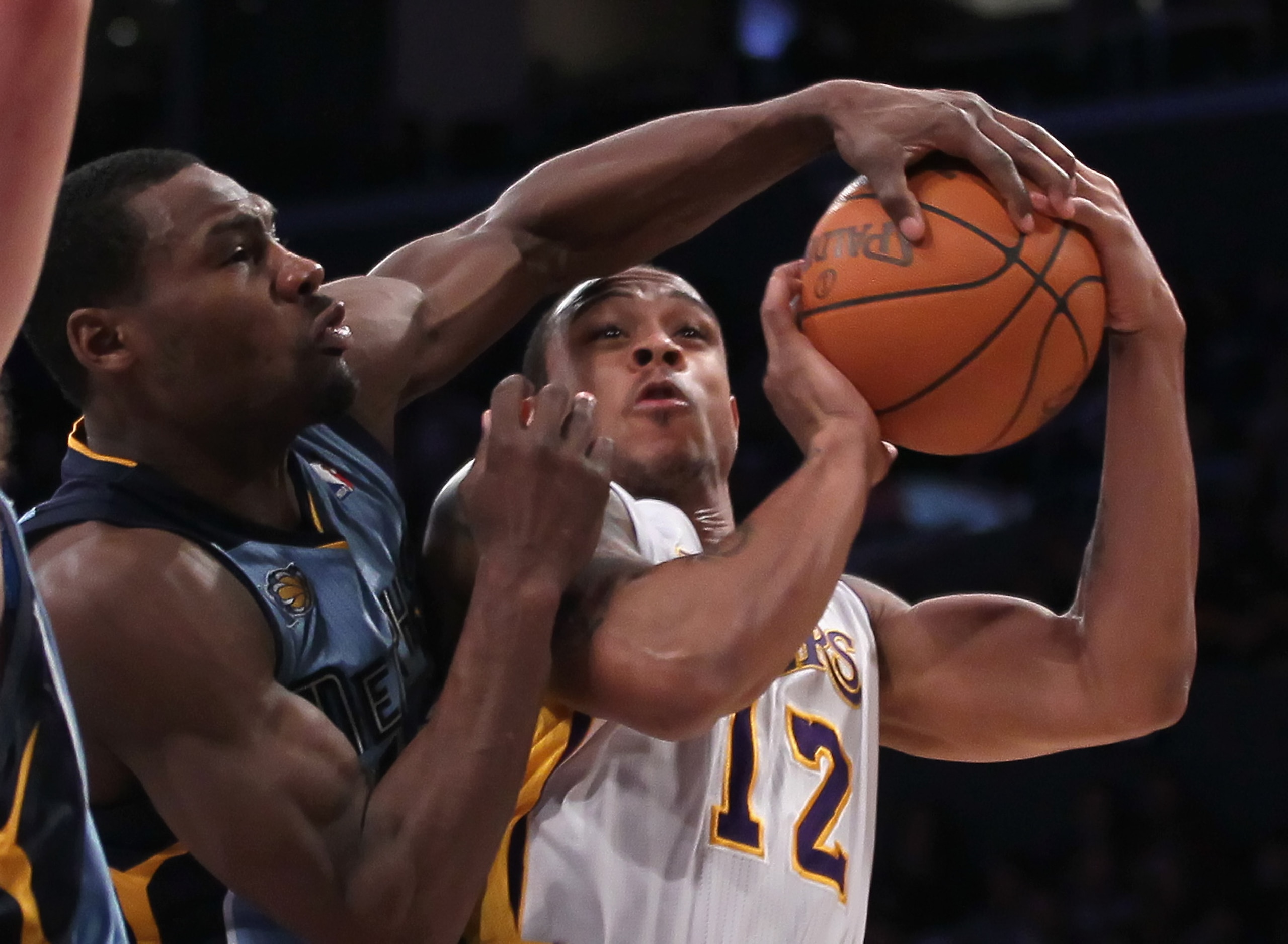 LOS ANGELES, CA - JANUARY 02:  Shannon Brown #12 of the Los Angeles Lakers is defended by Tony Allen #9 of the Memphis Grizzlies during the second half at Staples Center on January 2, 2011 in Los Angeles, California. The Grizzlies defeated the Lakers 104-
