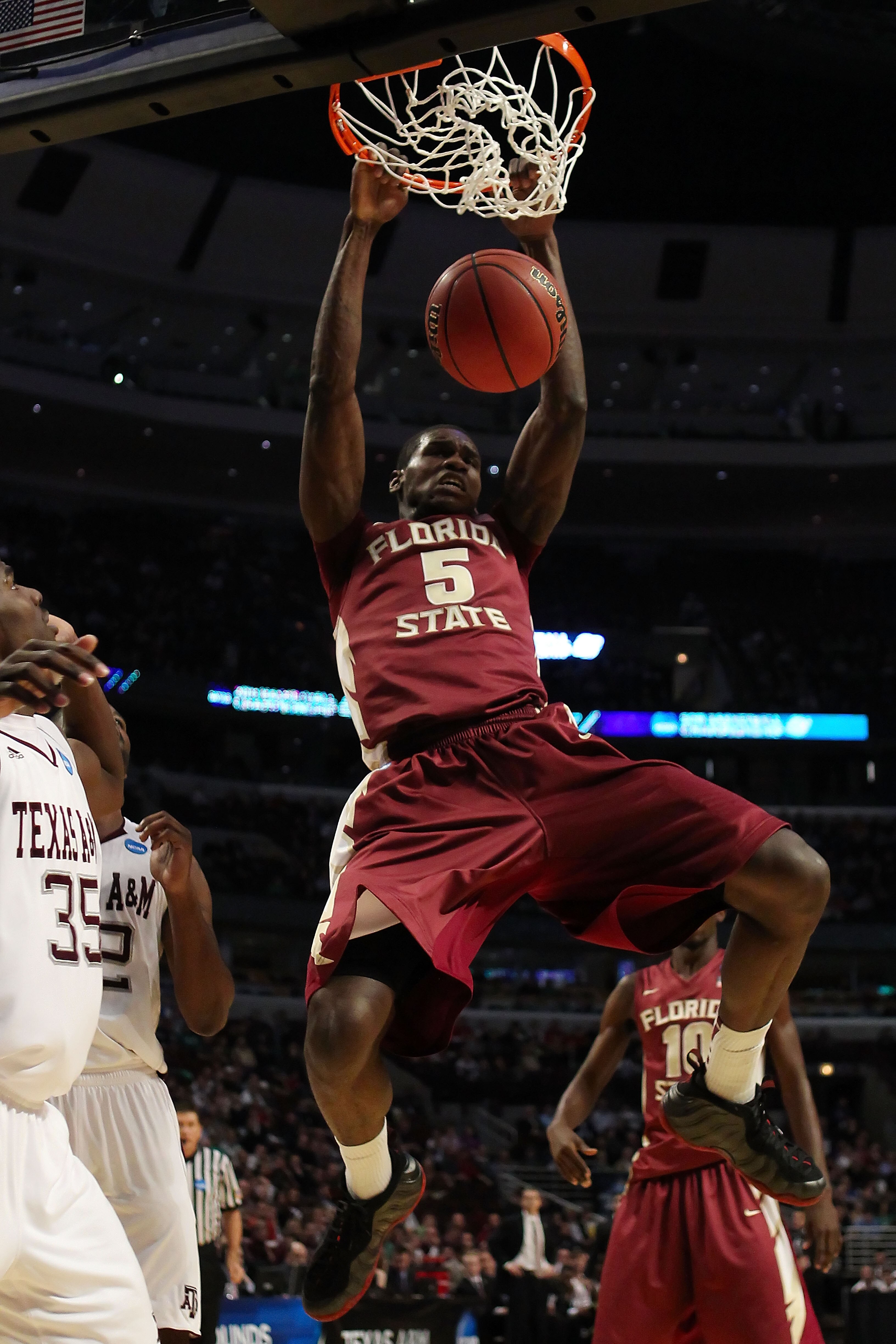 CHICAGO, IL - MARCH 18: Bernard James #5 of the Florida State Seminoles dunks against the Texas A&M Aggies in the second half during the second round of the 2011 NCAA men's basketball tournament at the United Center on March 18, 2011 in Chicago, Illinois.