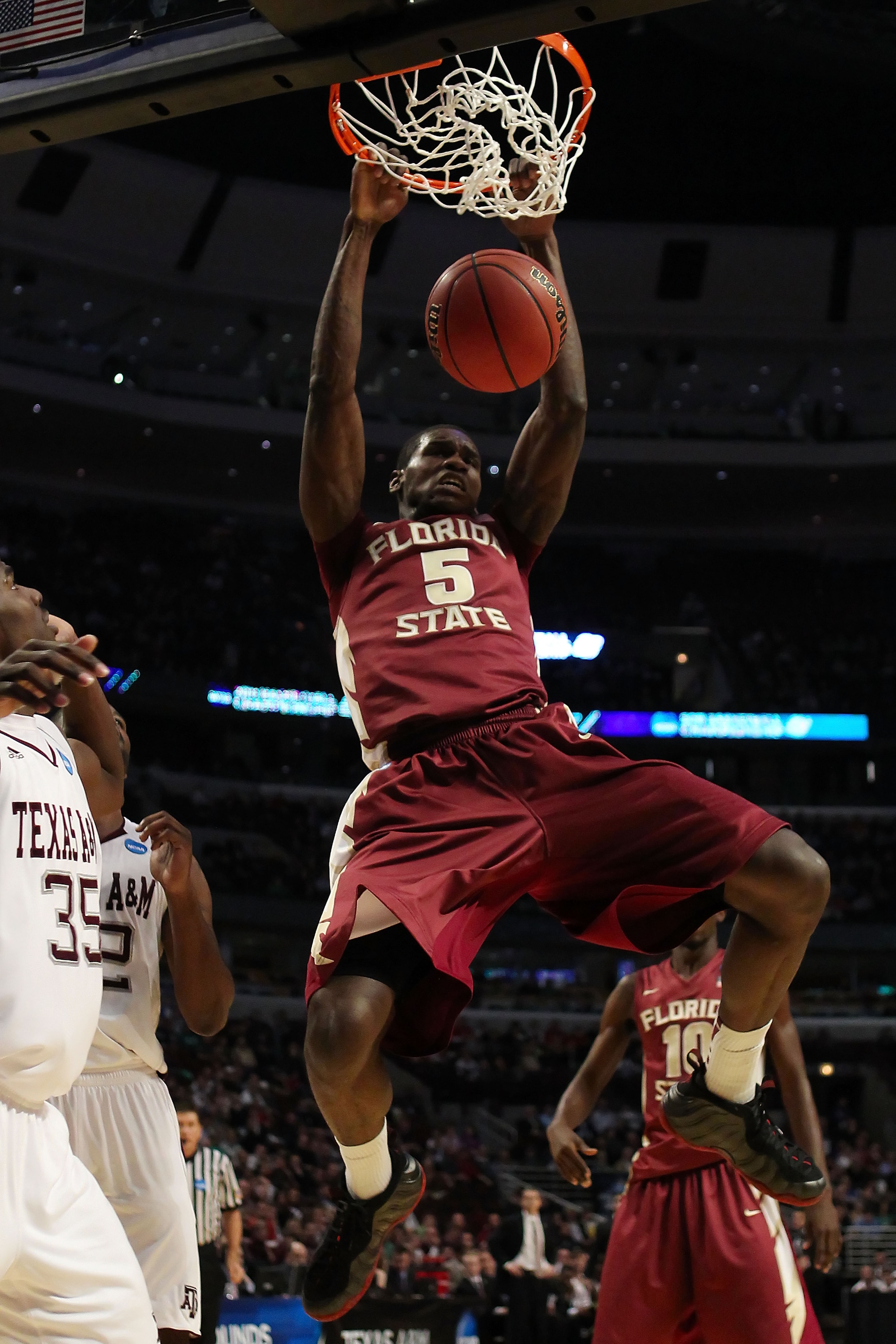 CHICAGO, IL - MARCH 18: Bernard James #5 of the Florida State Seminoles dunks against the Texas A&M Aggies in the second half during the second round of the 2011 NCAA men's basketball tournament at the United Center on March 18, 2011 in Chicago, Illinois.