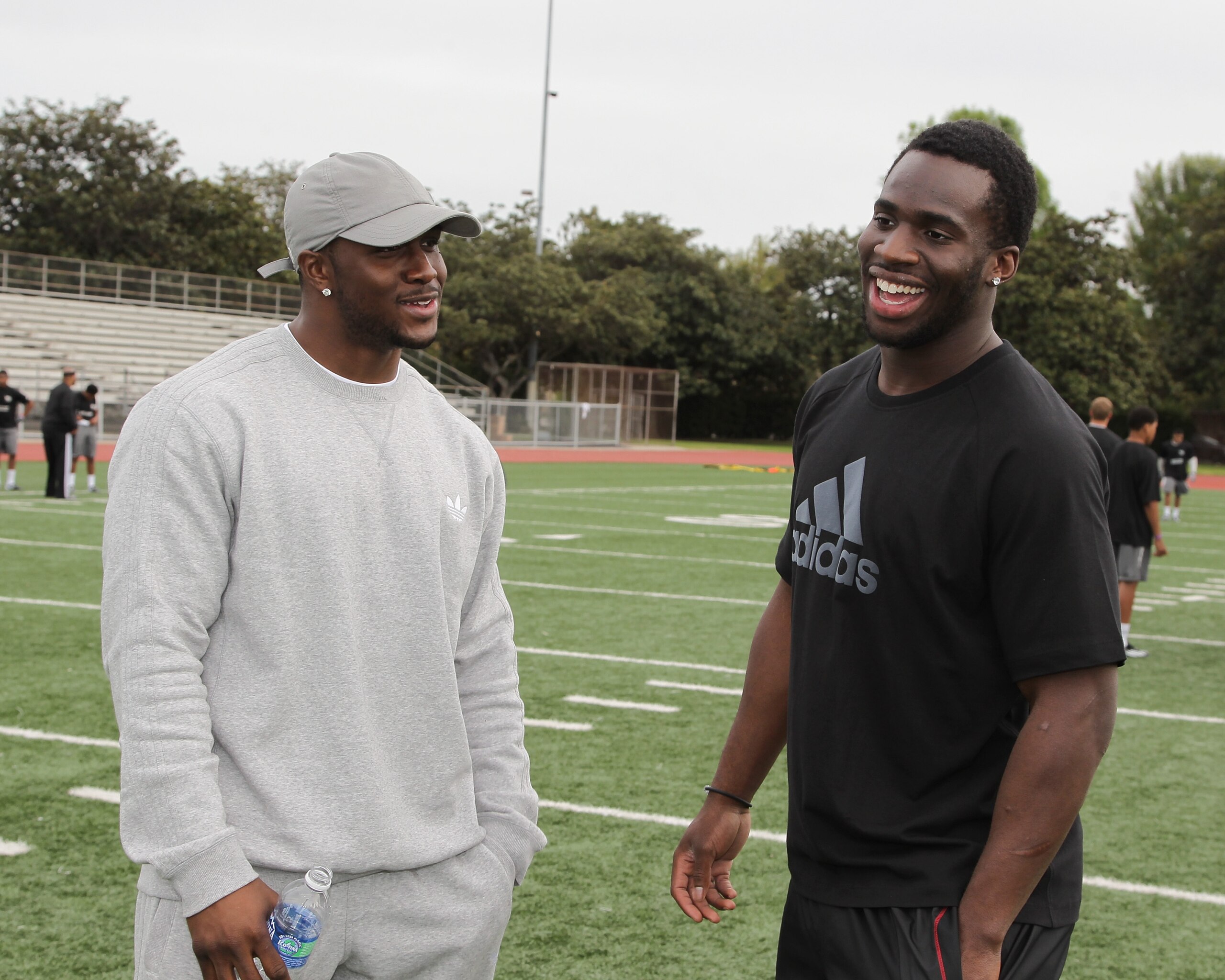 LOS ANGELES, CA - MARCH 19:  adidas, Reggie Bush and Prince Amukamara pop into a football practice in Los Angeles to capture game faces as part of the adidas Facebook Game Face contest.  (Photo by Noel Vasquez/Getty Images for adidas)