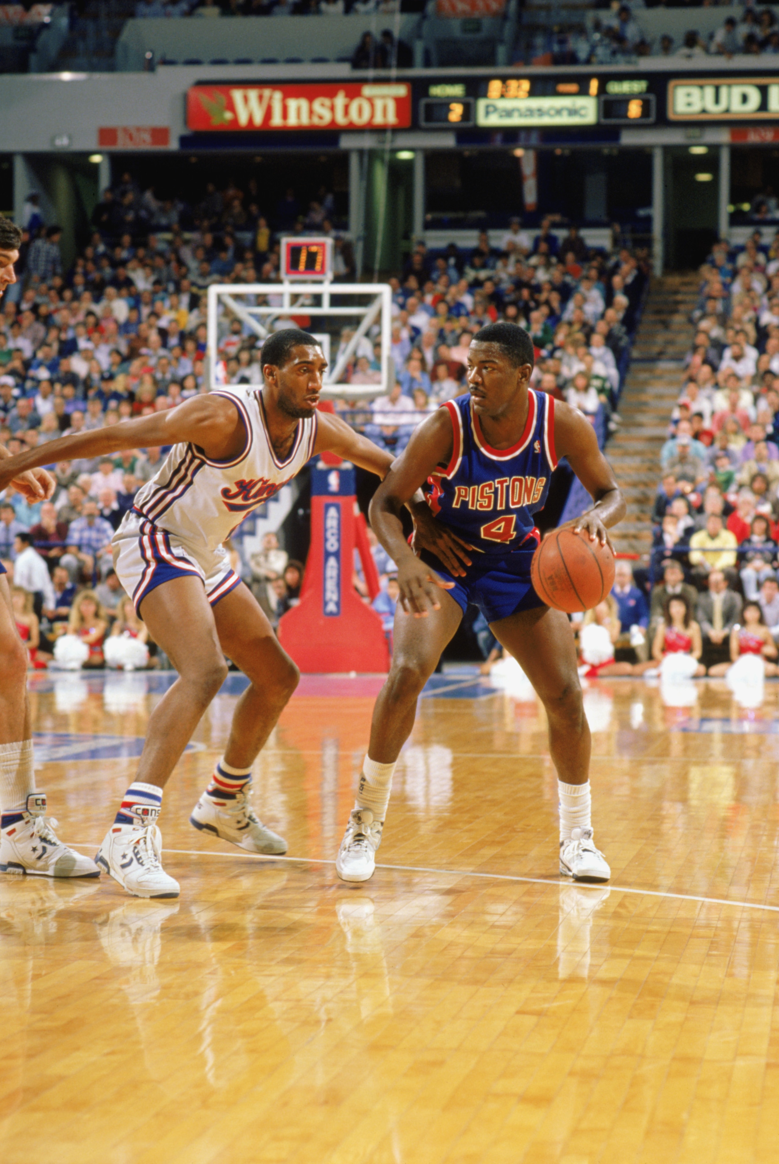 SACRAMENTO, CA - 1989:  Joe Dumars #4 of the Detroit Pistons moves the ball against the Sacramento Kings during the 1988-1989 NBA season game at the Arco Arena in Sacramento, California.  (Photo by Otto Greule Jr/Getty Images)