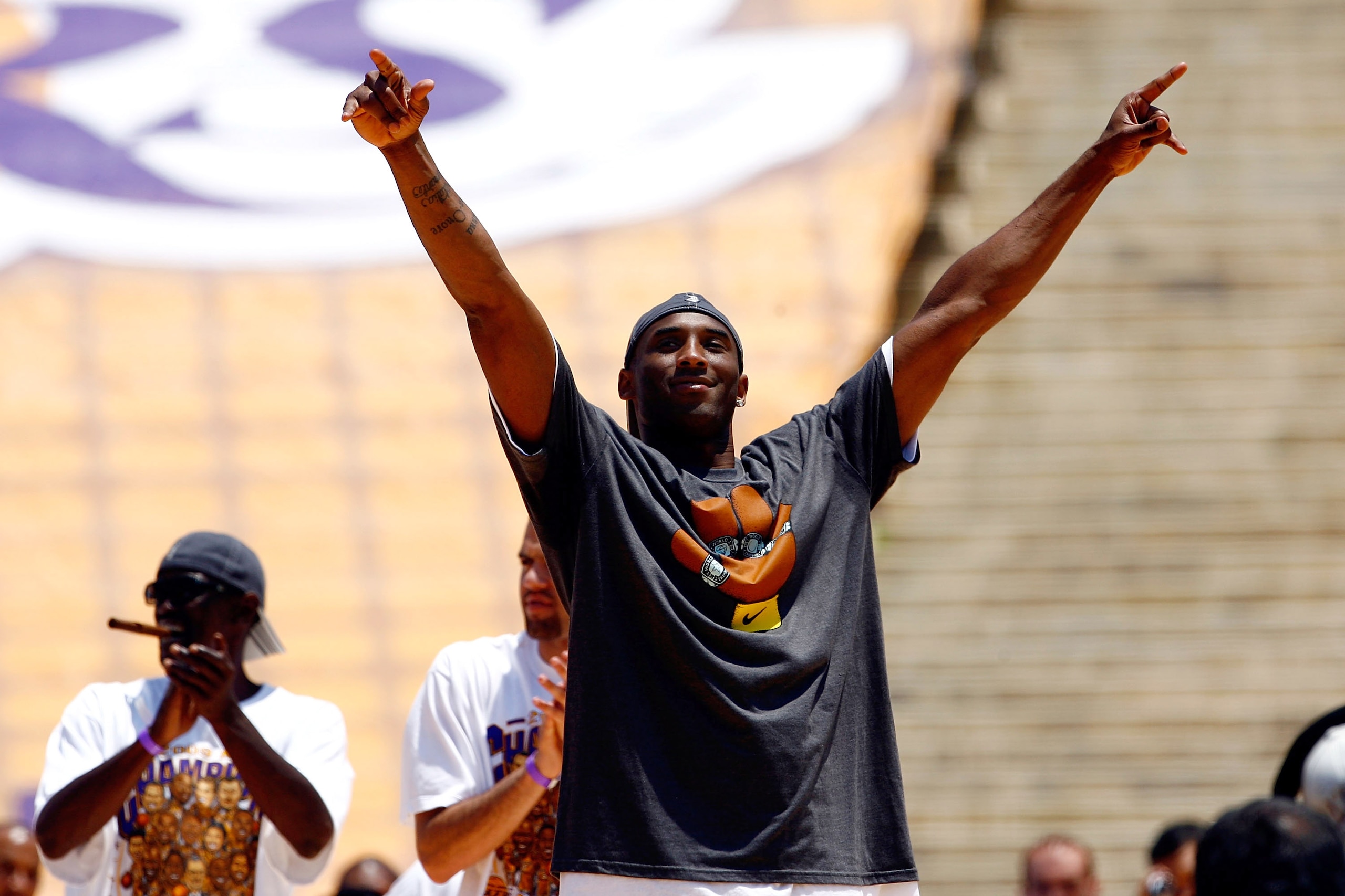 LOS ANGELES, CA - JUNE 17:  Kobe Bryant of the Los Angeles Lakers points to the crowd during the 2009 NBA Championship Victory Parade at the Los Angeles Memorial Coliseum on June 17, 2009 in Los Angeles, California.  (Photo by Jeff Gross/Getty Images)
