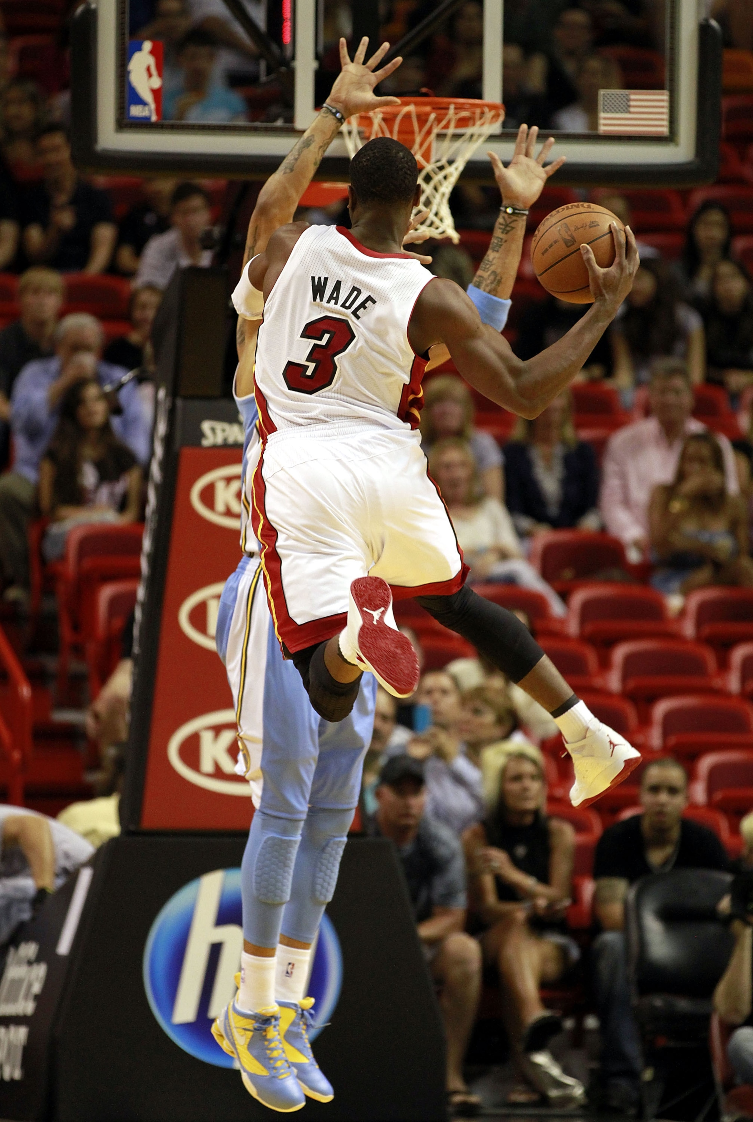 MIAMI, FL - MARCH 19:  Guard Dwyane Wade #3 of the Miami Heat shoots against the Denver Nuggets at American Airlines Arena on March 19, 2011 in Miami, Florida. The Heat defeated the Nuggets 103-98. NOTE TO USER: User expressly acknowledges and agrees that