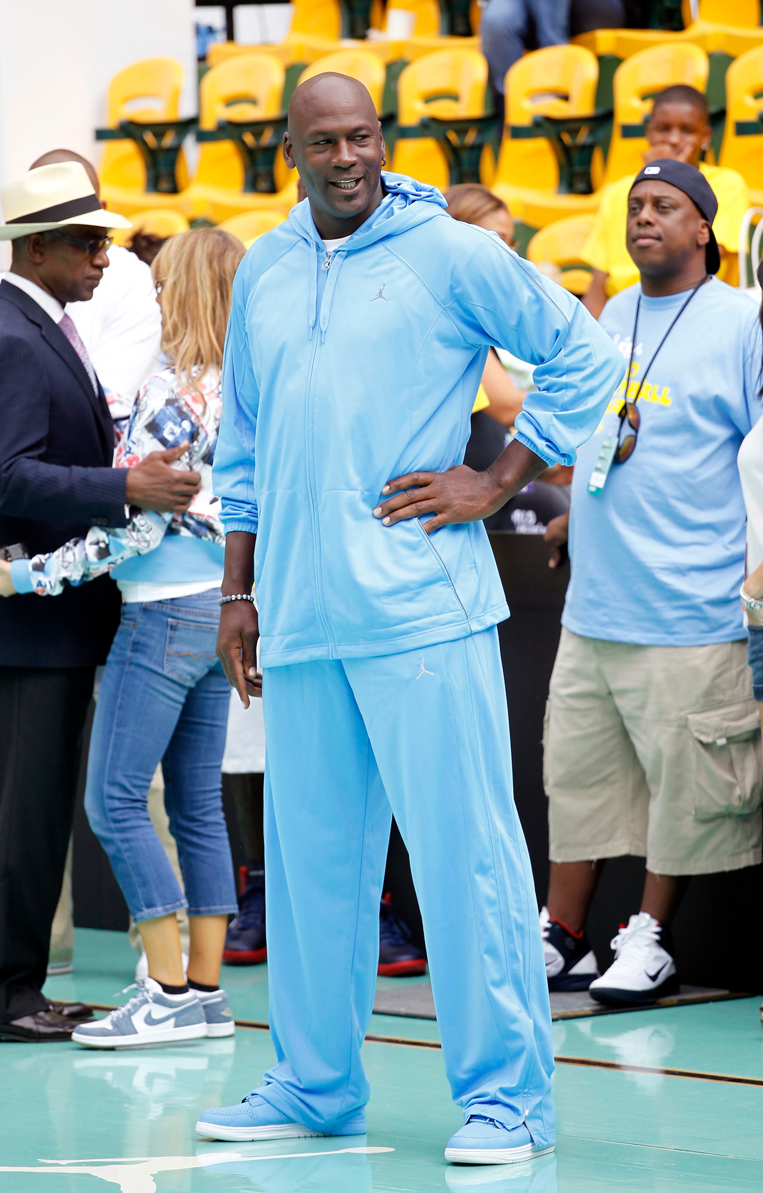 NEW YORK CITY, NY - AUGUST 13: Michael Jordan looks on during the World Basketball Festival at Rucker Park on August 13, 2010 in New York City.  (Photo by Chris Trotman/Getty Images for Nike)