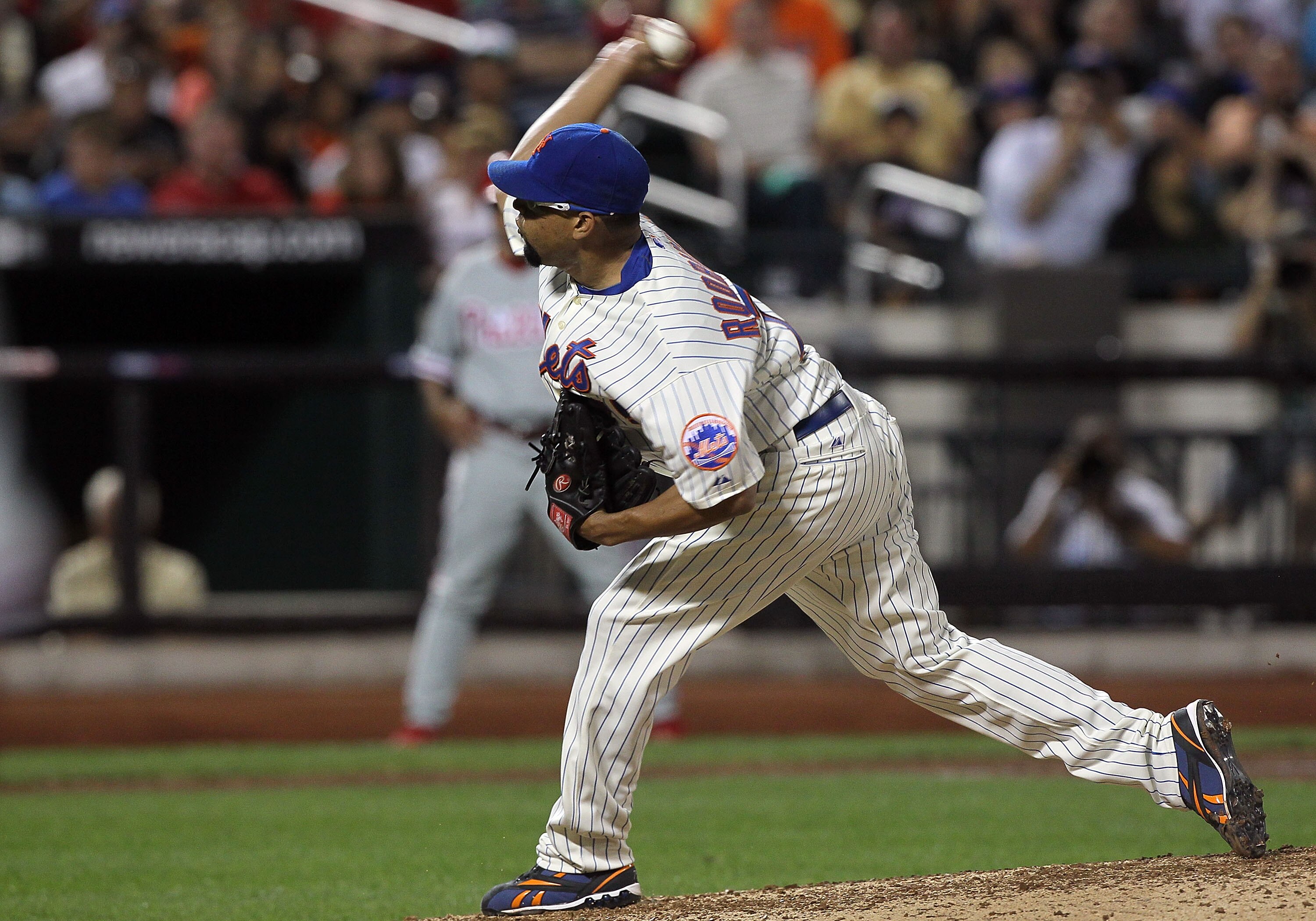 NEW YORK - AUGUST 14:  Francisco Rodriguez #75 of the New York Mets delivers a pitch in the ninth inning against the Philadelphia Phillies on August 14, 2010 at Citi Field in the Flushing neighborhood of the Queens borough of New York City. The Phillies d