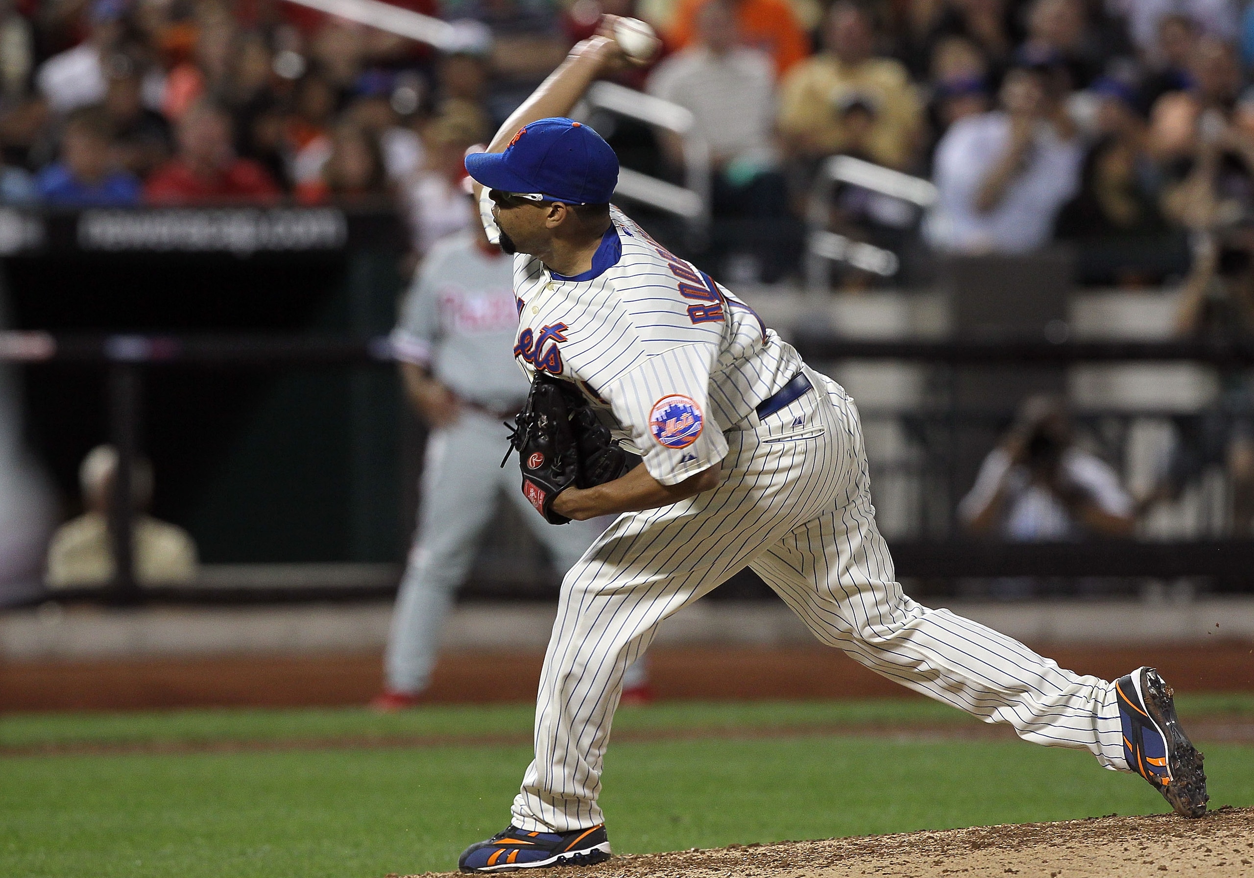 NEW YORK - AUGUST 14:  Francisco Rodriguez #75 of the New York Mets delivers a pitch in the ninth inning against the Philadelphia Phillies on August 14, 2010 at Citi Field in the Flushing neighborhood of the Queens borough of New York City. The Phillies d