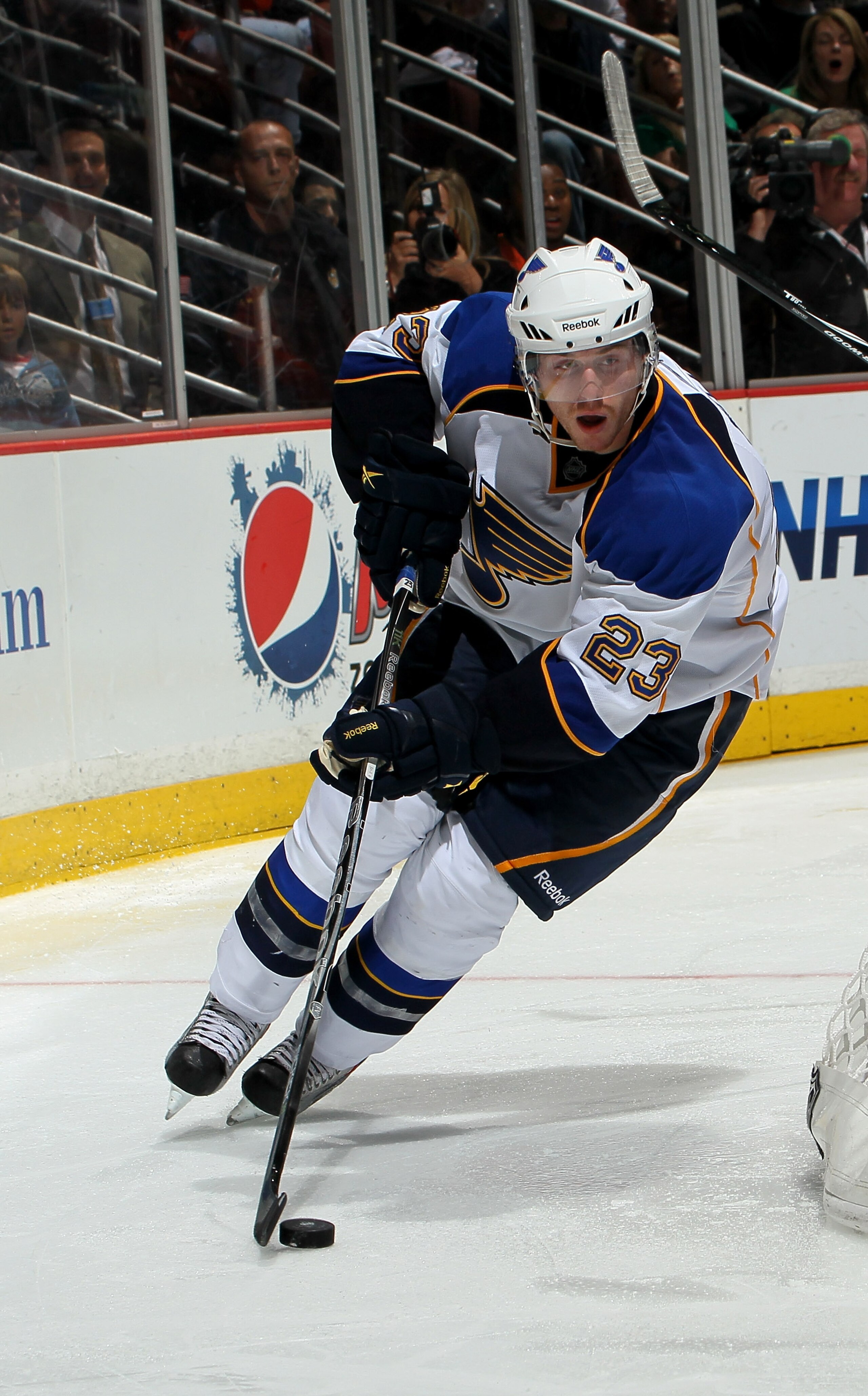 ANAHEIM, CA - MARCH 16:  Ian Cole #23 of the St. Louis Blues skates with the puck against the Anaheim Ducks at Honda Center on March 16, 2011 in Anaheim, California.  Anaheim won 2-1.   (Photo by Stephen Dunn/Getty Images)