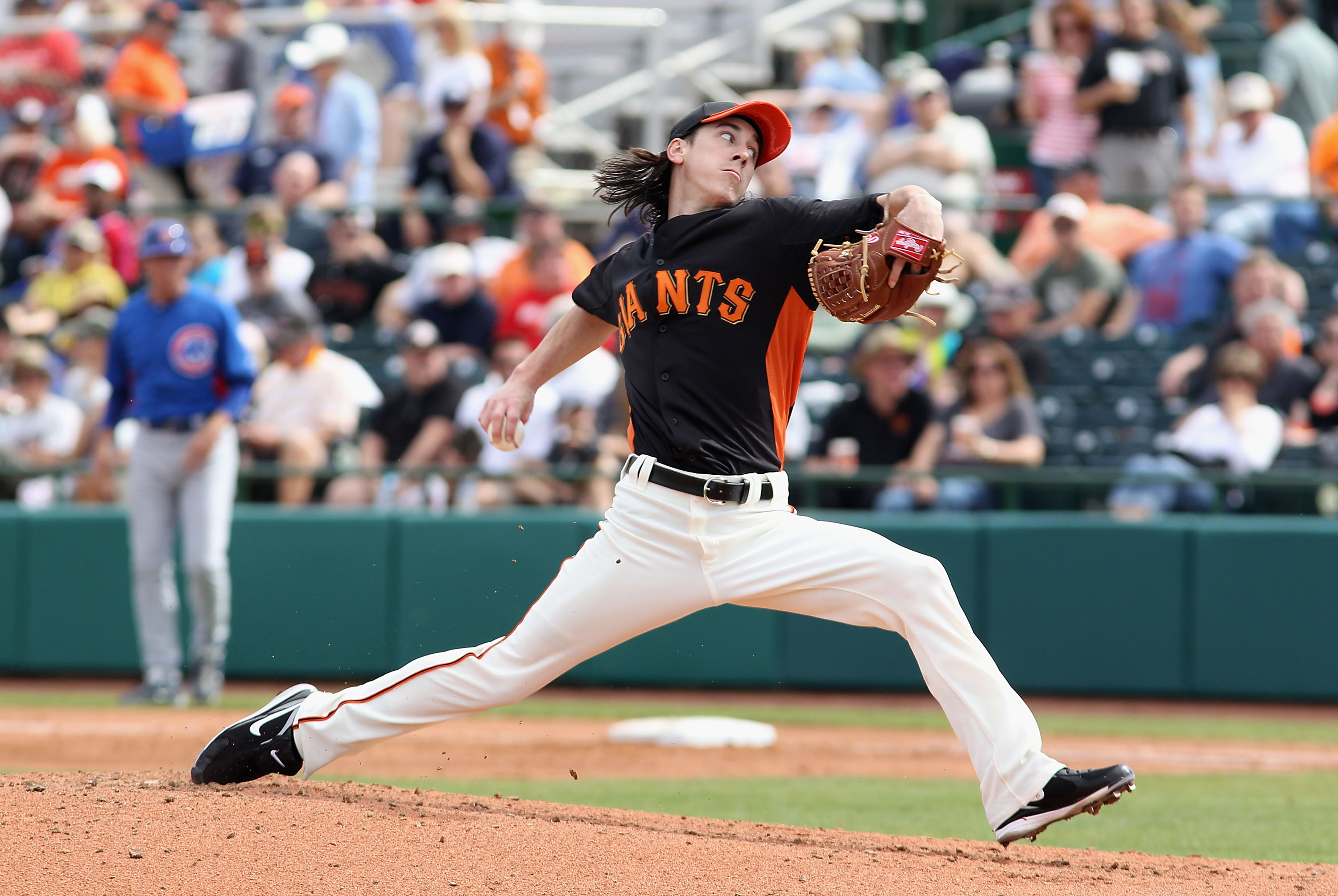 SCOTTSDALE, AZ - MARCH 01:  Starting pitcher Tim Lincecum #55 of the San Francisco Giants pitches against the Chicago Cubs during the spring training game at Scottsdale Stadium on March 1, 2011 in Scottsdale, Arizona.  (Photo by Christian Petersen/Getty I