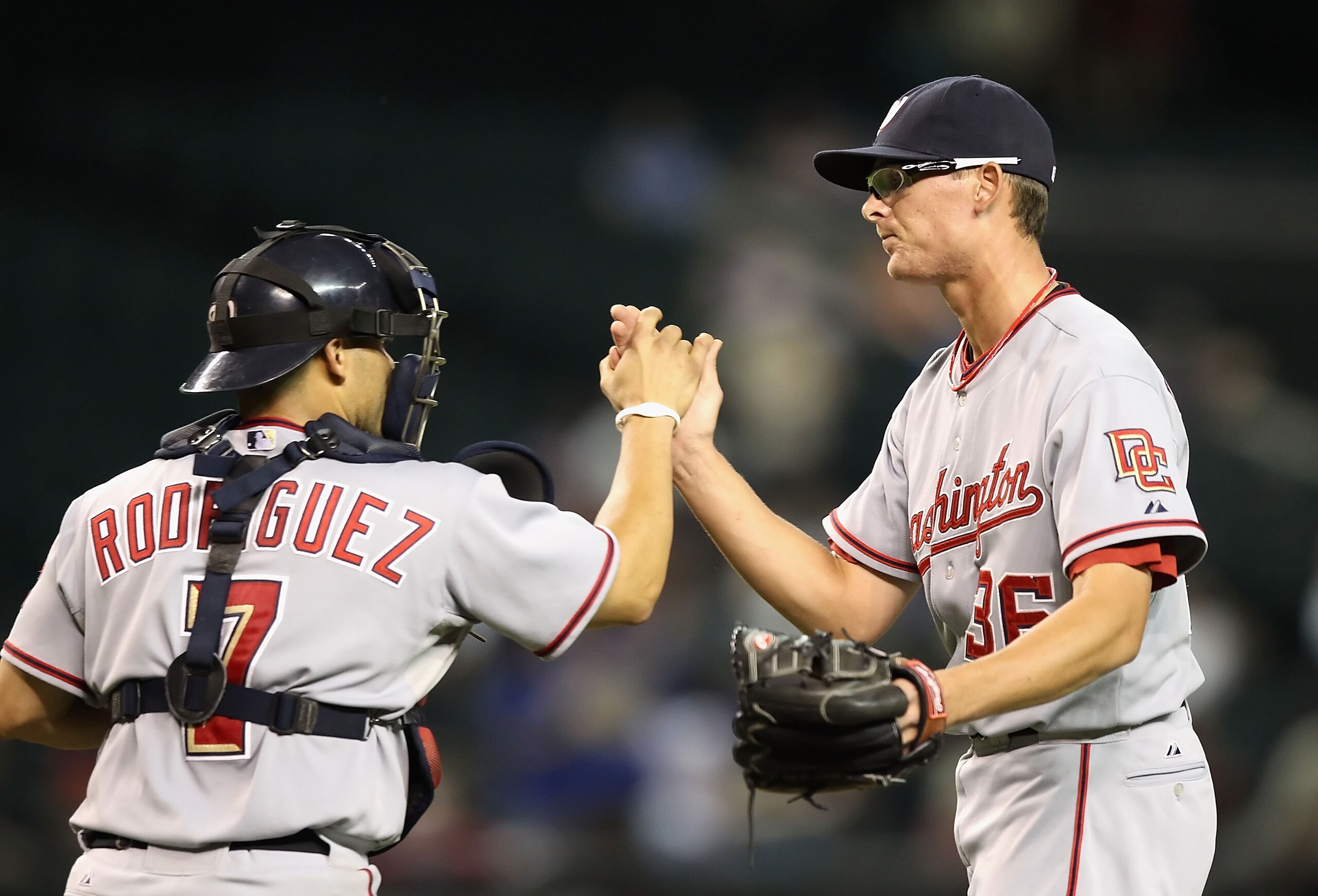 PHOENIX - AUGUST 04:  Relief pitcher Tyler Clippard #36 of the Washington Nationals celebrates with catcher Ivan Rodriguez #7 after defeating the Arizona Diamondbacks during the Major League Baseball game at Chase Field on August 4, 2010 in Phoenix, Arizo
