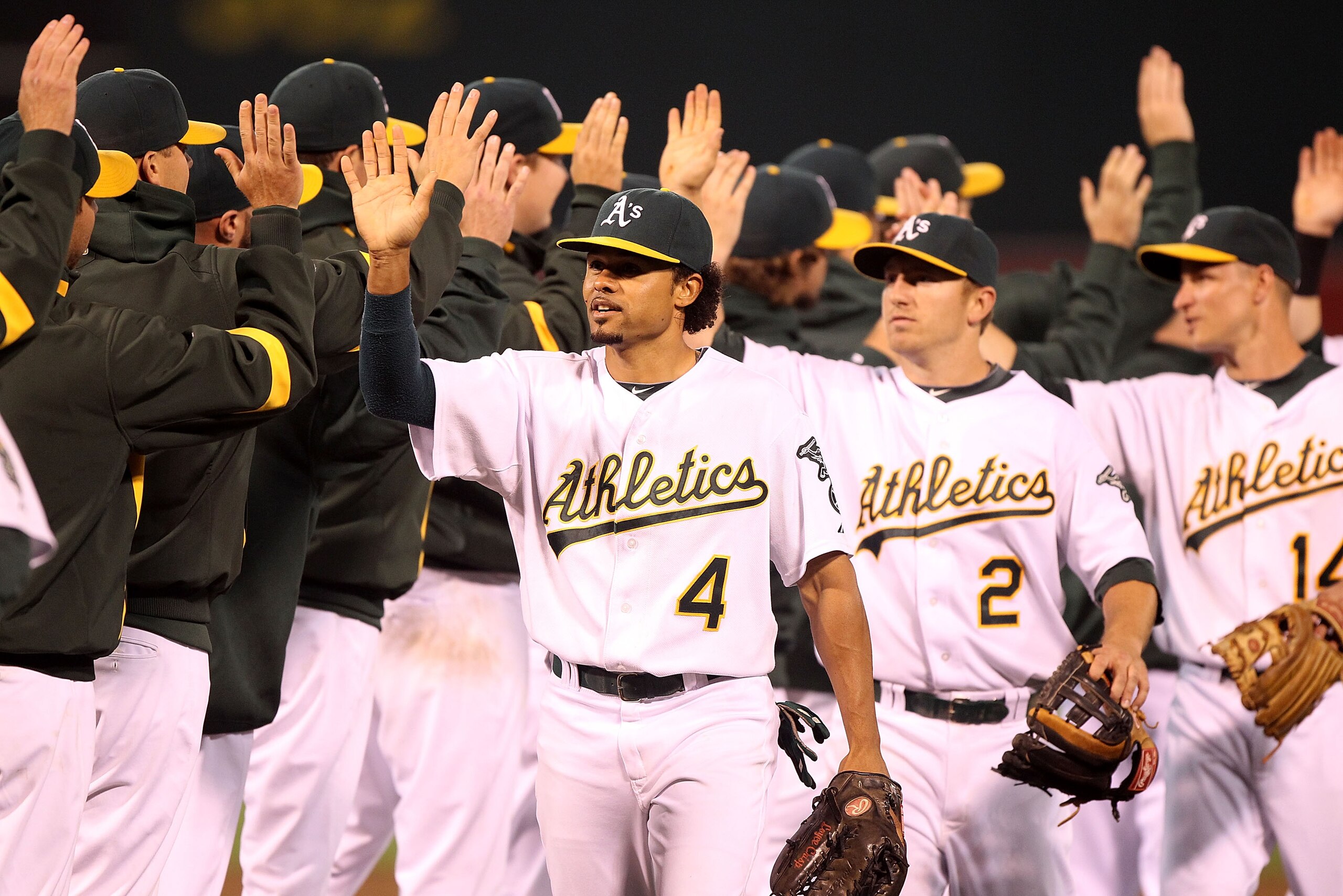 OAKLAND, CA - AUGUST 19:  Coco Crisp #4 of the Oakland Athletics celebrates after defeating the Tampa Bay Rays during an MLB game at the Oakland-Alameda County Coliseum on August 19, 2010 in Oakland, California.  (Photo by Jed Jacobsohn/Getty Images)