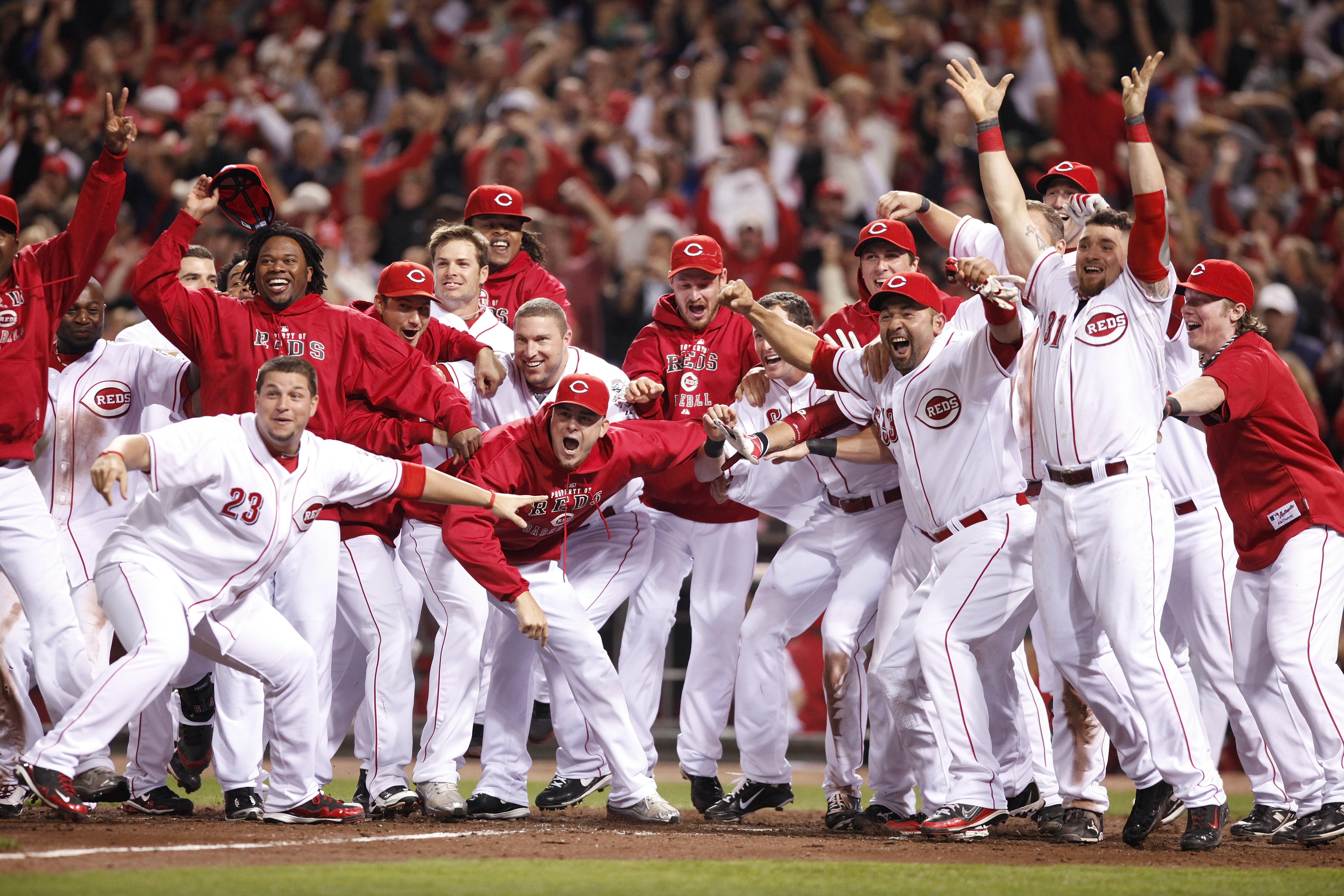 CINCINNATI, OH - SEPTEMBER 28: The Cincinnati Reds celebrate Jay Bruce's walk off home run against the Houston Astros at Great American Ball Park on September 28, 2010 in Cincinnati, Ohio. The Reds won 3-2 to clinch the NL Central Division title. (Photo b