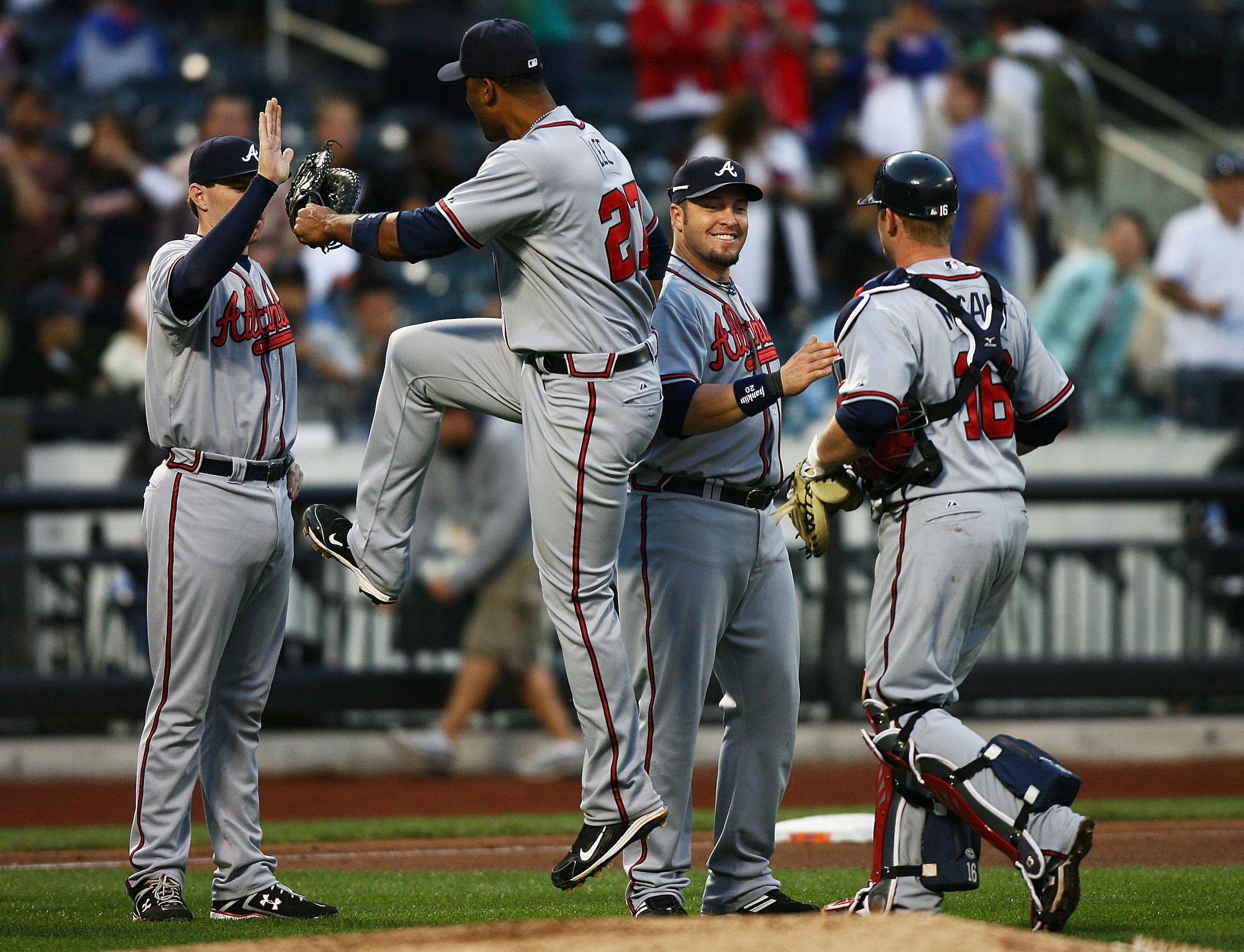 NEW YORK - SEPTEMBER 18:  Derek Lee #27 of the Atlanta Braves jumps in celebration after beating the New York Mets 4 - 2 on September 18, 2010 at Citi Field in the Flushing neighborhood of the Queens borough of New York City.  (Photo by Andrew Burton/Gett